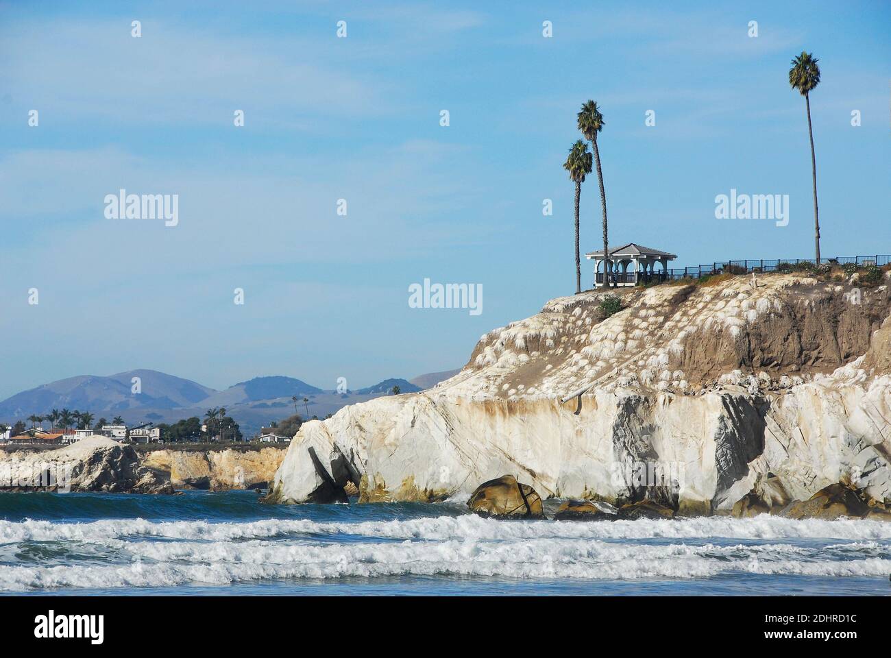 Clifftop hotel with palms and gazebo in Pismo Beach in San Luis Obispo County, California, famous for its Pismo Clams, beaches, and sand dunes. Stock Photo