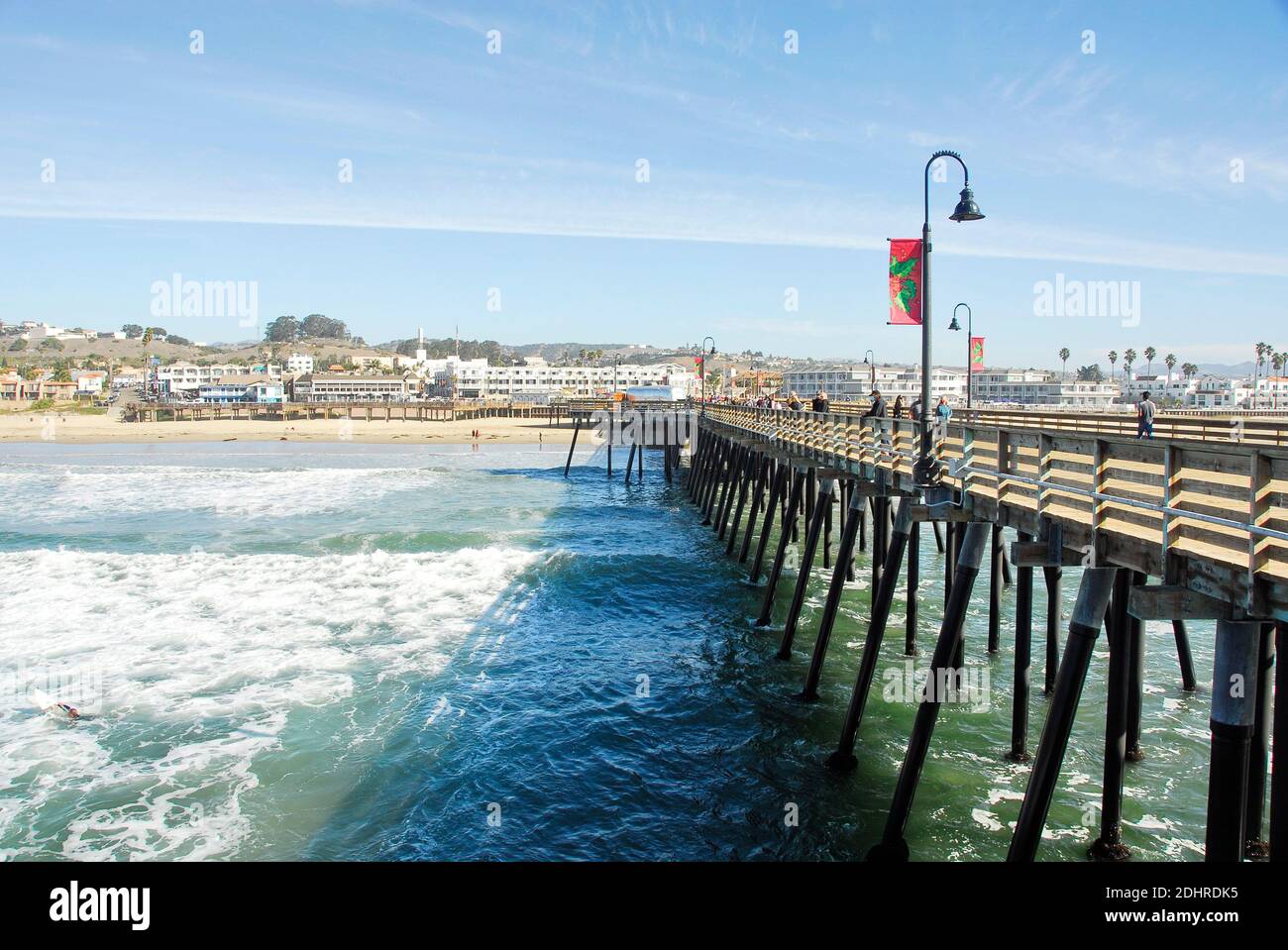 The pier at Pismo Beach in San Luis Obispo County, California, famous for its Pismo Clams, beaches, and sand dunes. Stock Photo