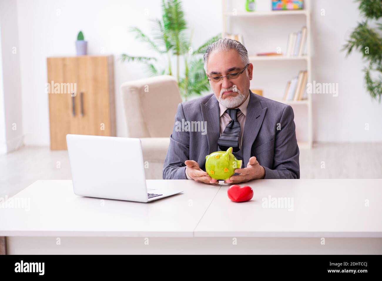 Old man in romantic concept Stock Photo - Alamy