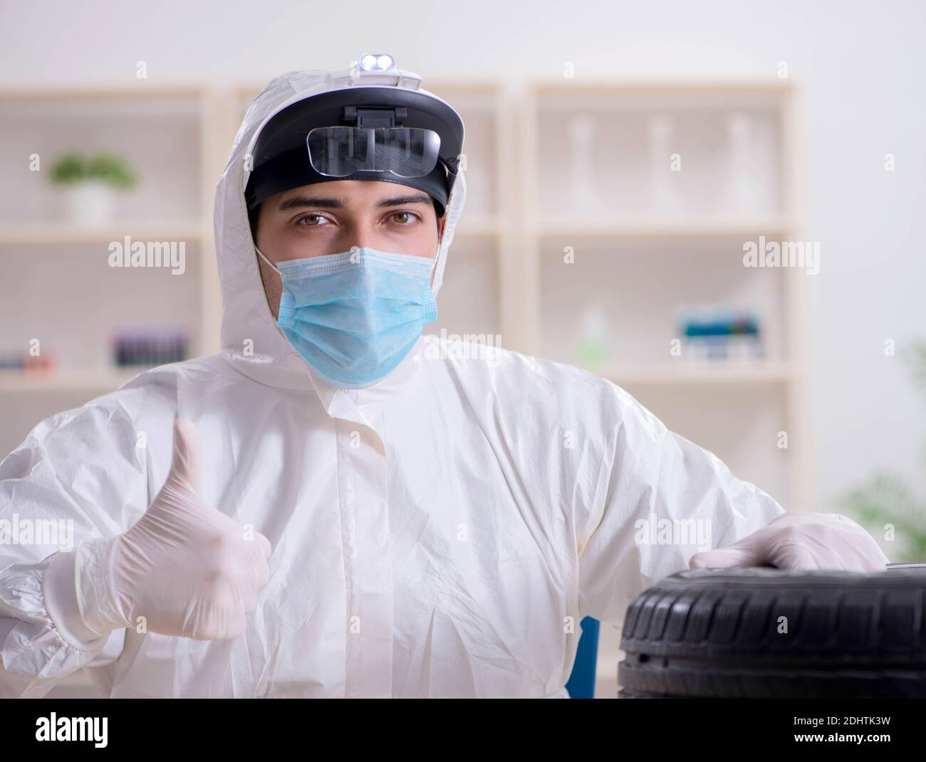 The expert is looking at car accident evidence Stock Photo Alamy