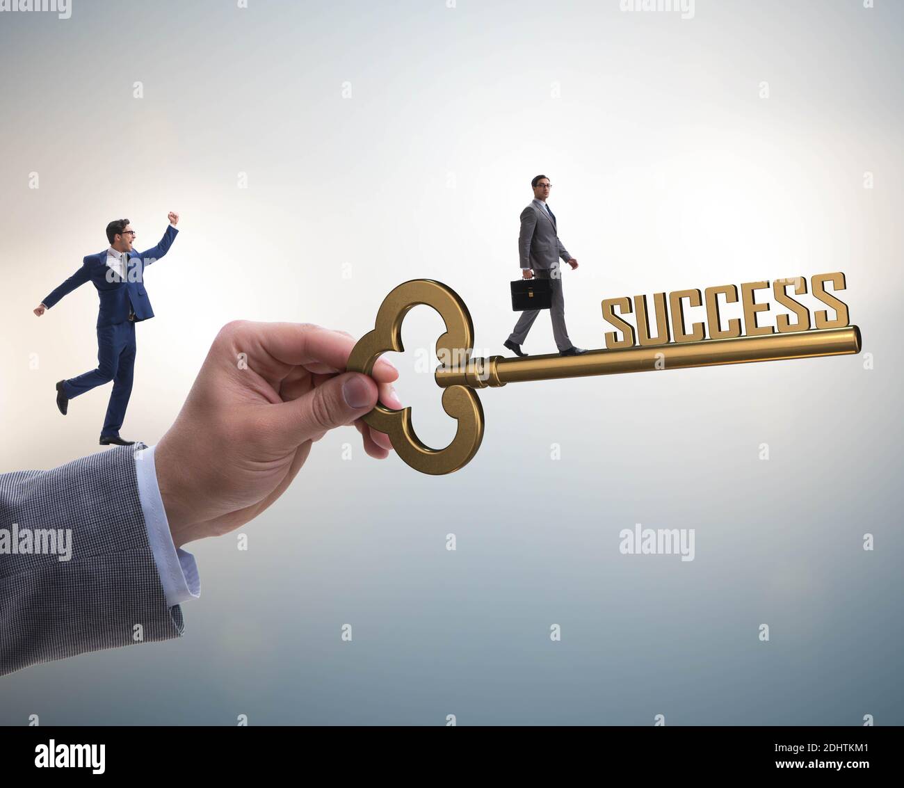 The businessman with key to success business concept Stock Photo - Alamy