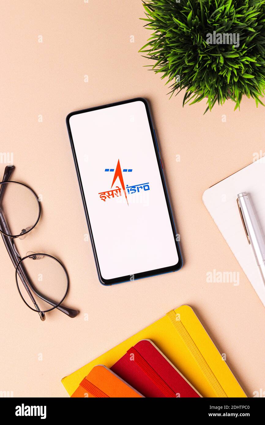 Assam, india - December 20, 2020 : Indian Space Research Organisation (ISRO) logo on phone screen stock image. Stock Photo