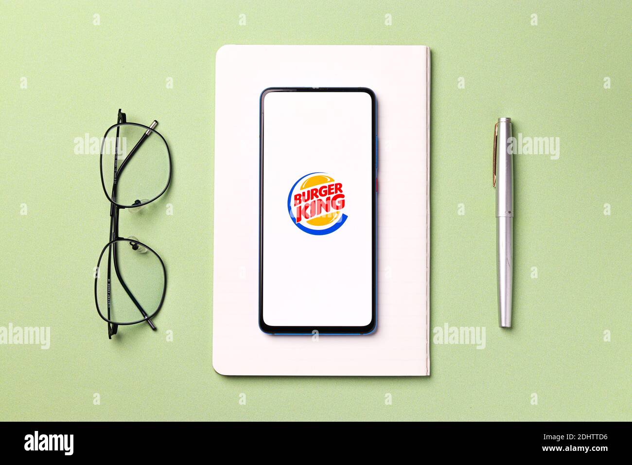 Assam, india - December 20, 2020 : Burger King logo on phone screen stock image. Stock Photo