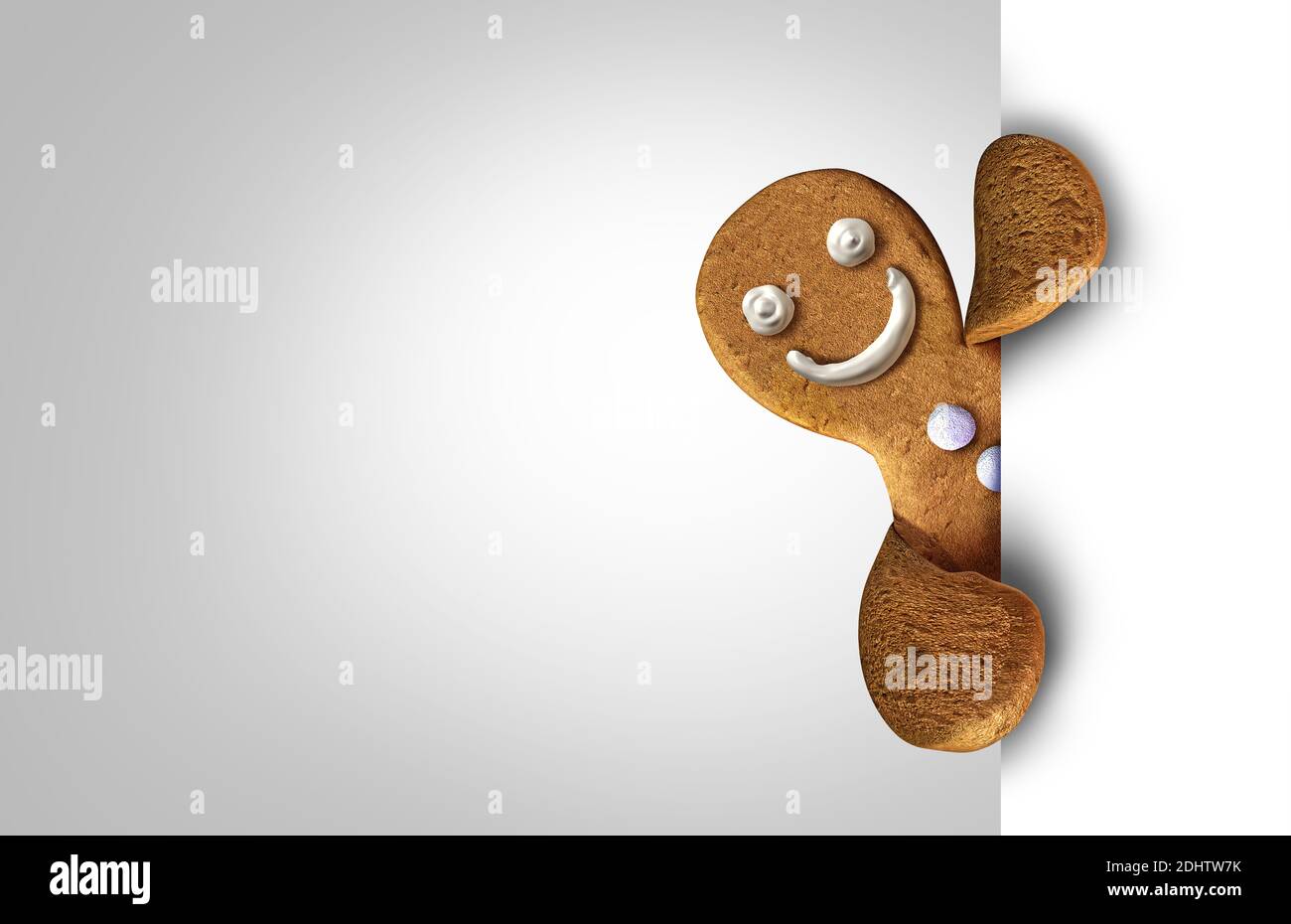 Gingerbread man with icing as a holiday cookie holding a sign or a ginger bread character behind a blank card as festive baking or festive holidays. Stock Photo