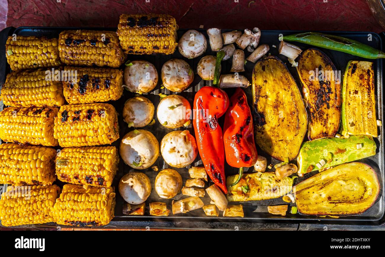 grilled mushrooms and vegetables on a grill, healthy food for dinner