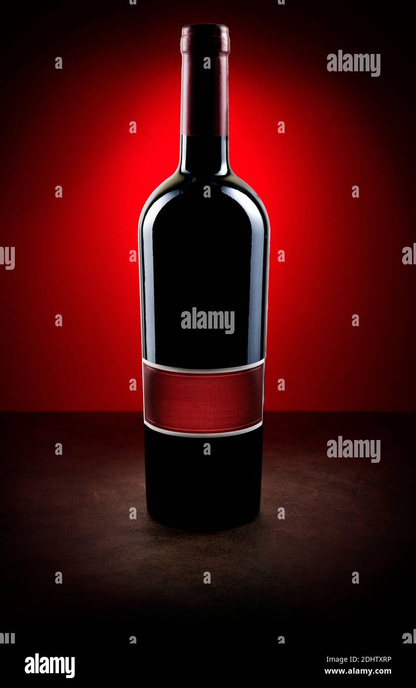Red wine bottle concept studio lights Stock Photo Alamy