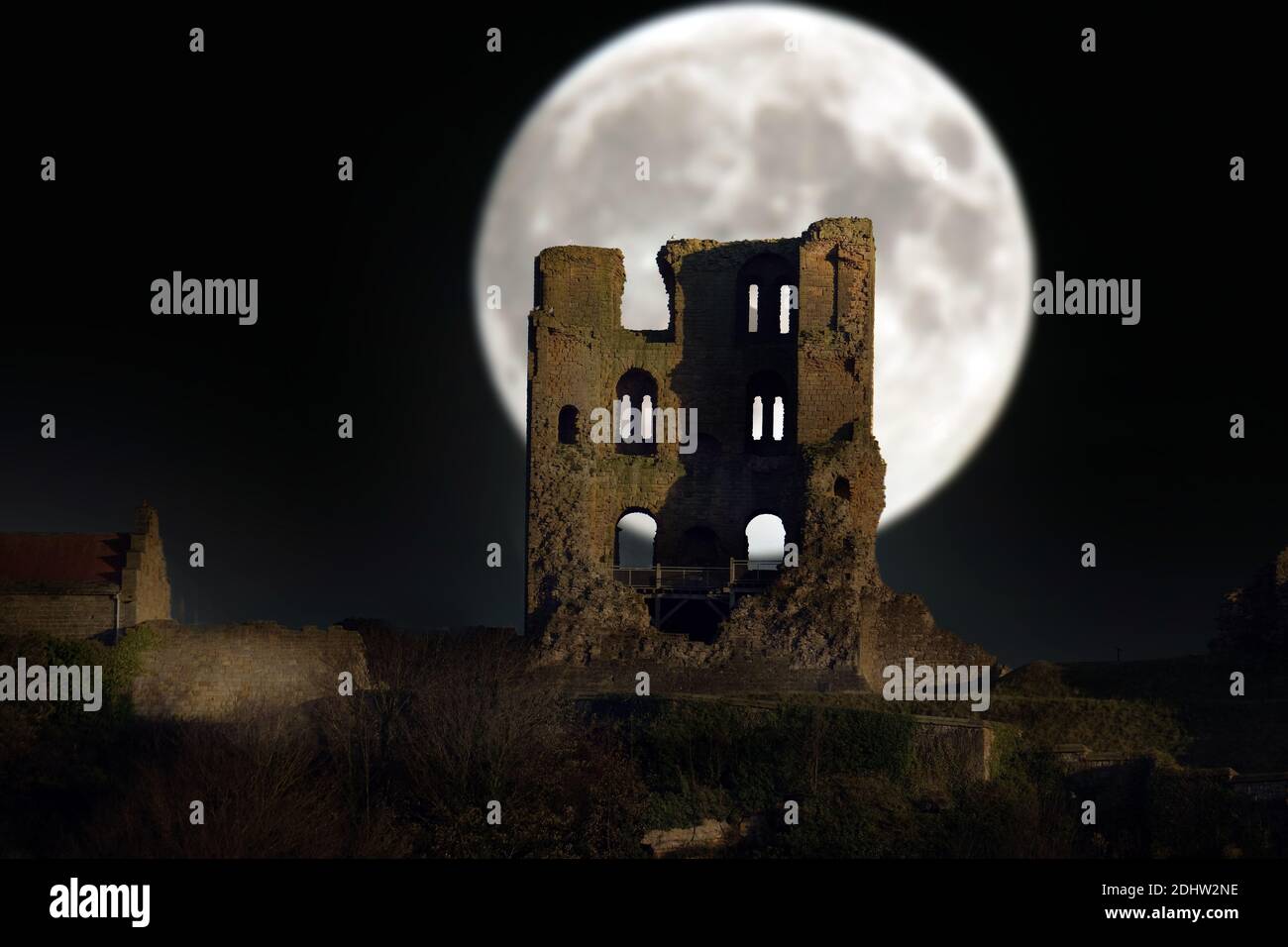 Scasrborough castle with moon added for visual effect. Stock Photo