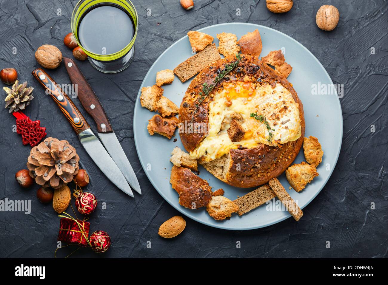 Baked camembert cheese and homemade bread.French cheese. Stock Photo