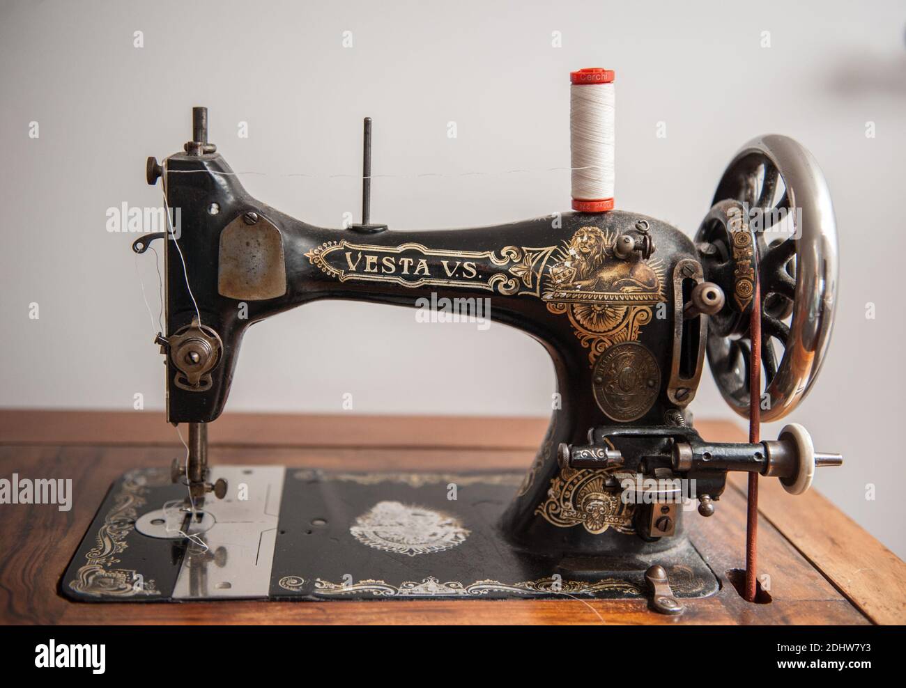 An old Vesta sewing machine, fully functional after almost a hundred years of life Stock Photo