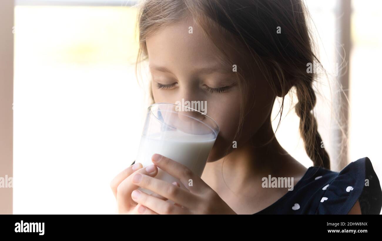 Toddler Girl Drinking Milk From A Bottle Stock Photo, Picture and Royalty  Free Image. Image 102654580.