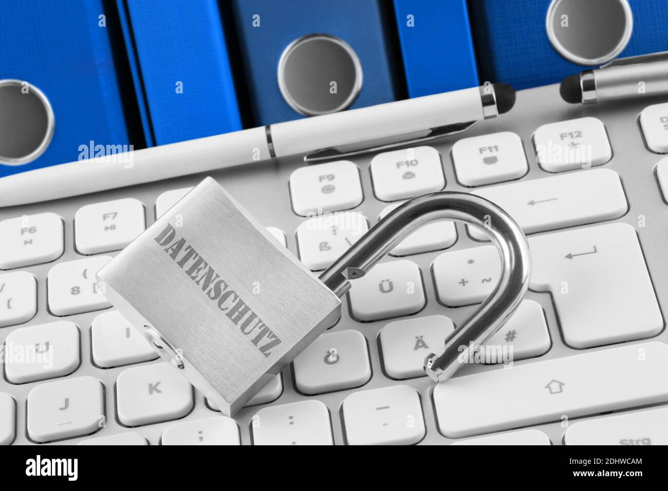 Lock with file folders, keyboard and German Data protection Stock Photo