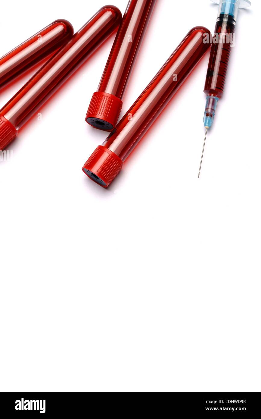 Medical syringe and plastic test tube isolated on white background ...