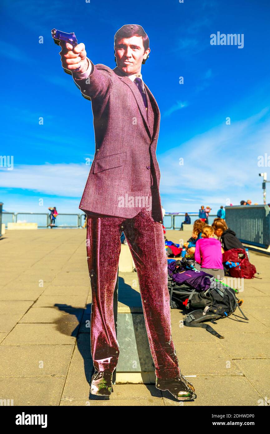 Piz Gloria, Schilthorn, Murren, Switzerland - Aug 19, 2020: George Lazenby actor 3D poster from the movie On Her Majesty's Secret Service in 1969 Stock Photo