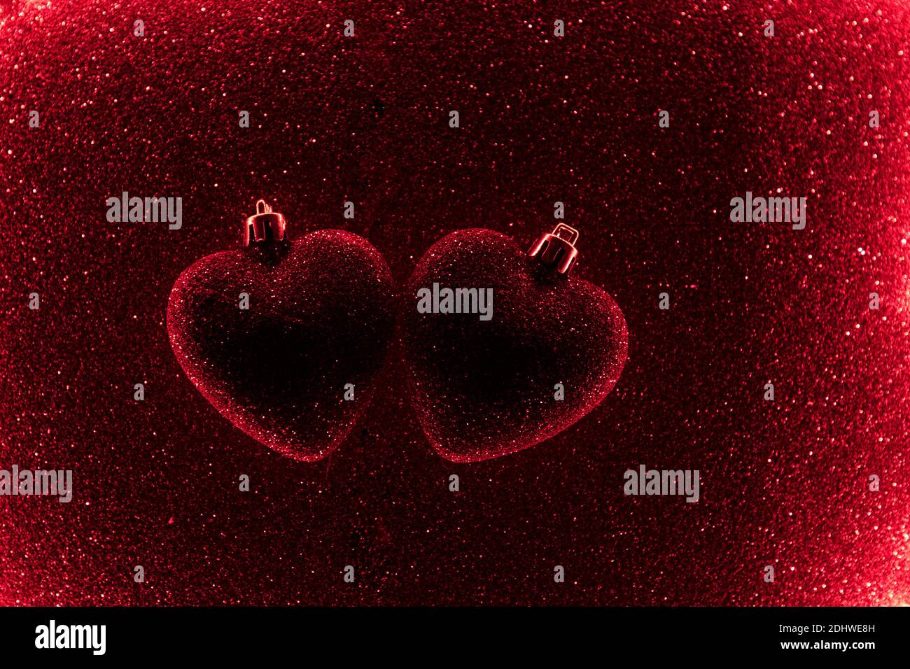 red shiny heart on a red background. background for valentine's day ...