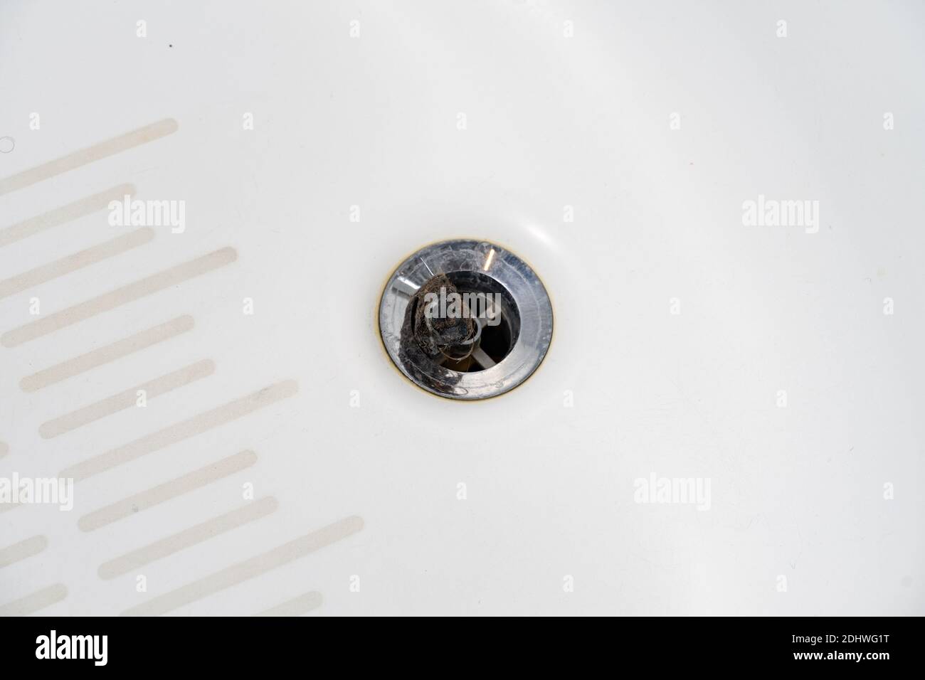 cleaning the clogged bathroom drain. clogged drain in the bathroom Stock Photo Alamy