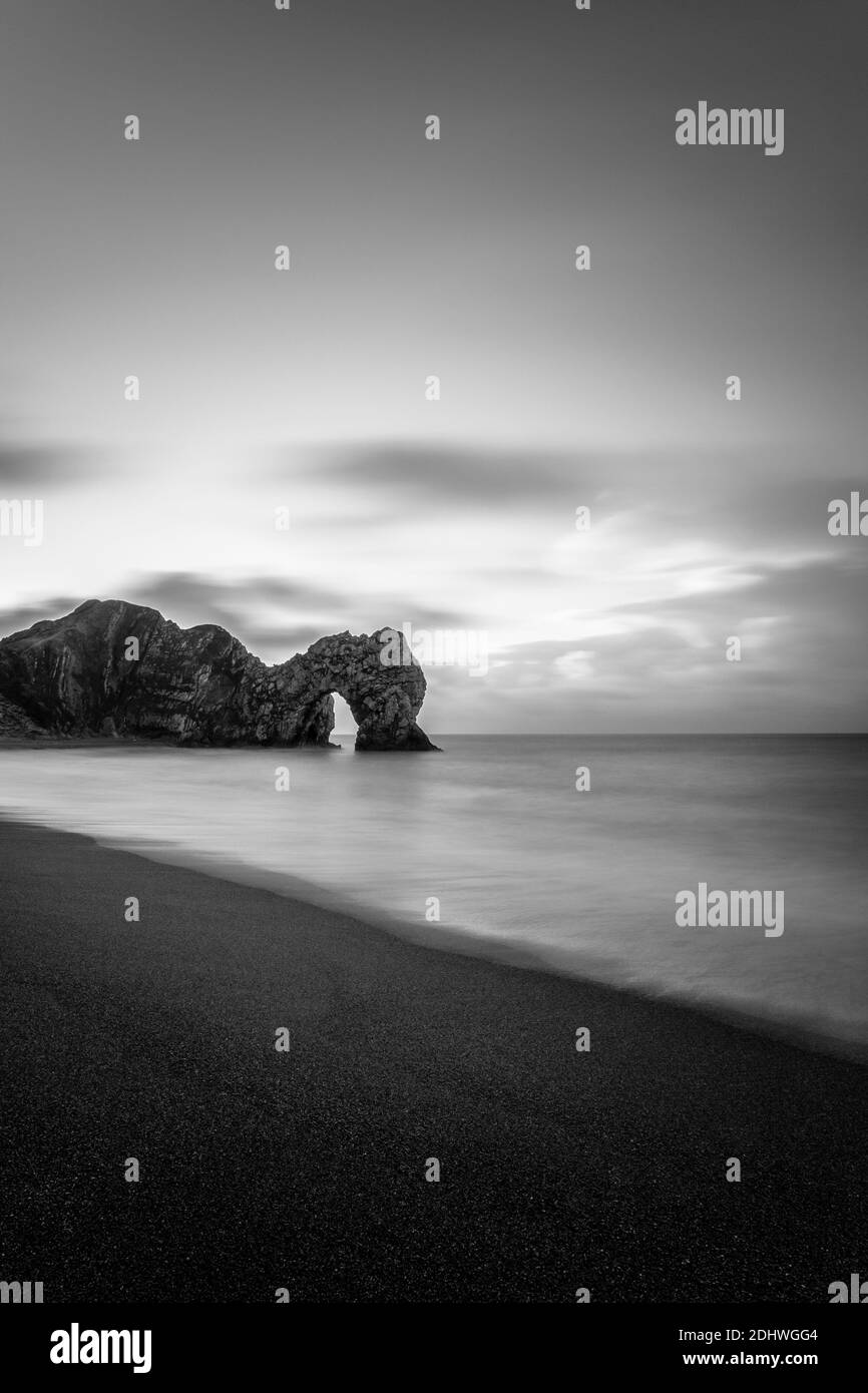 Long exposure black and white image of Durdle Door. Stock Photo