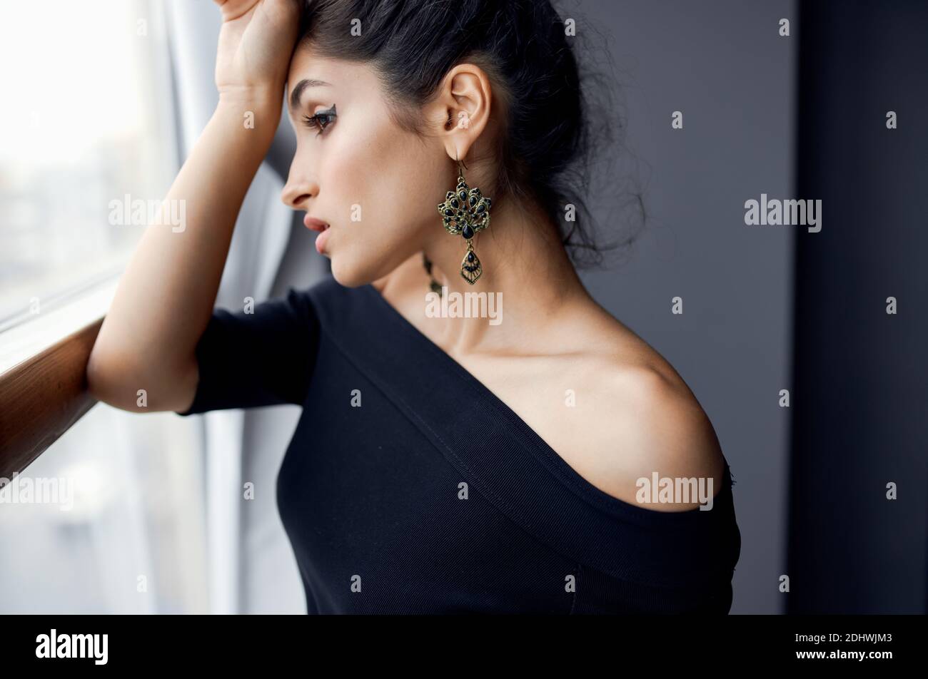 Premium Photo | Portrait of young indian woman with beautiful makeup and  hairstyle on brown wall