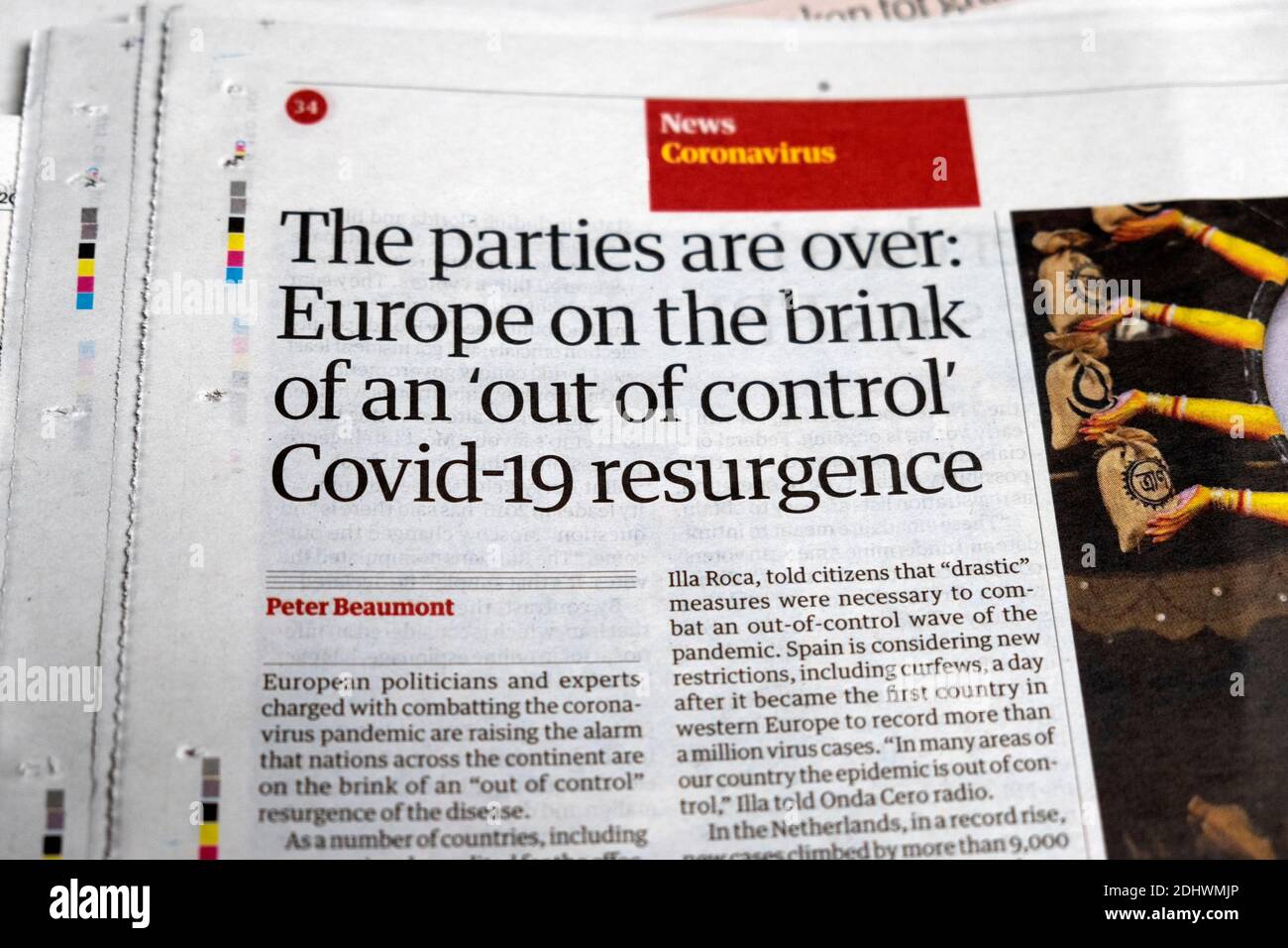 'The parties are over: Europe on the brink of an 'out of control' Covid-19 resurgence'  newspaper headline inside article 23 October 2020 London UK Stock Photo