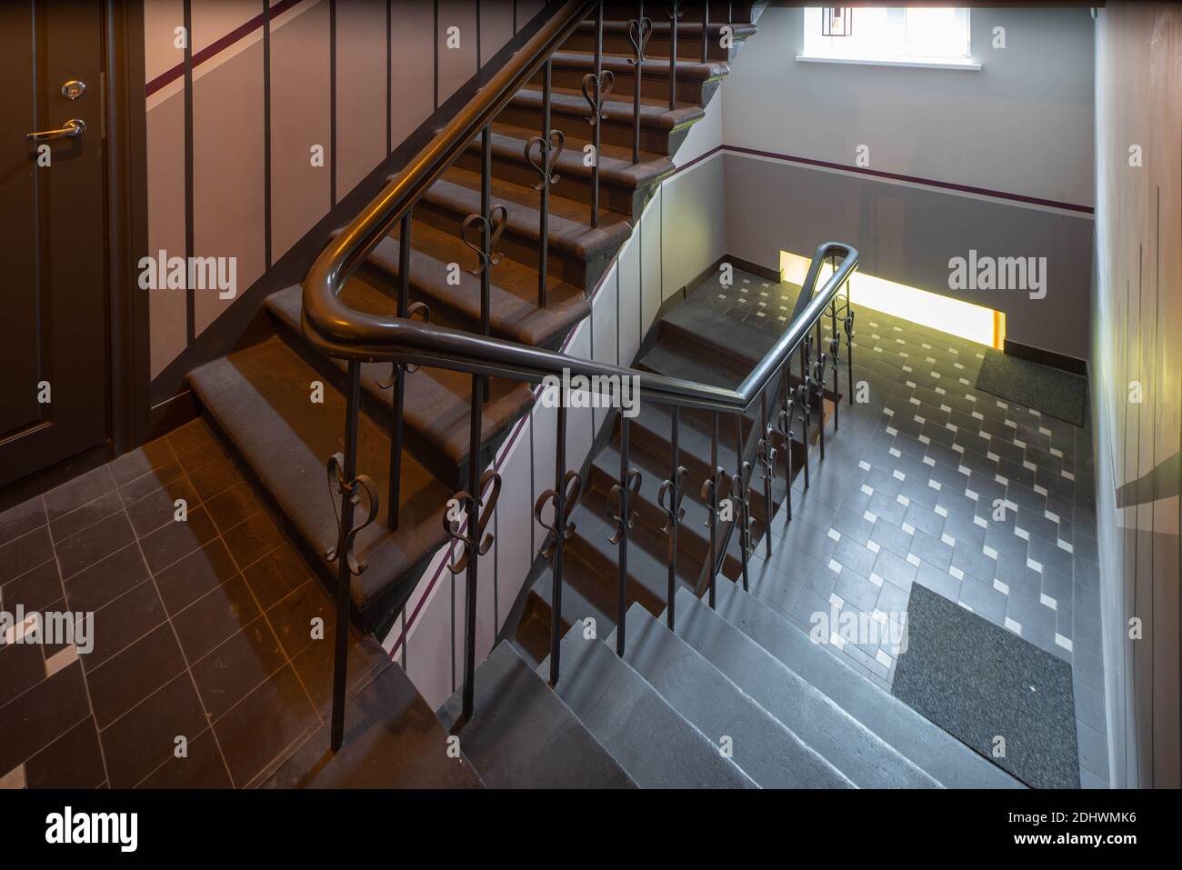Modern interior of hall in block of flats. Entrance in residential