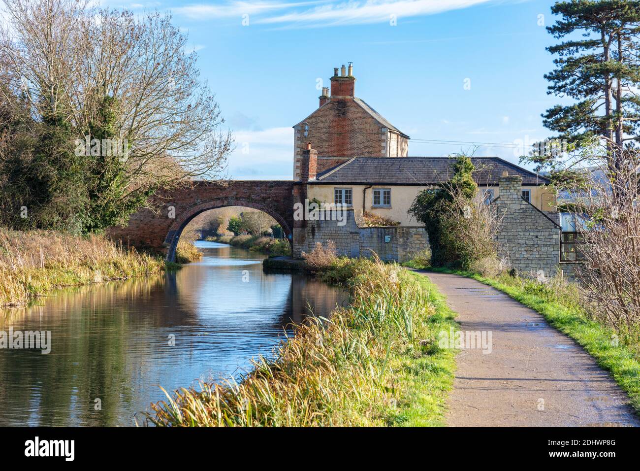 Nutshell Bridge and adjoing house on the Stroudwater Navigation near Stonehouse Stroud, England. The bridge and house were built in 1778 and are Grade Stock Photo