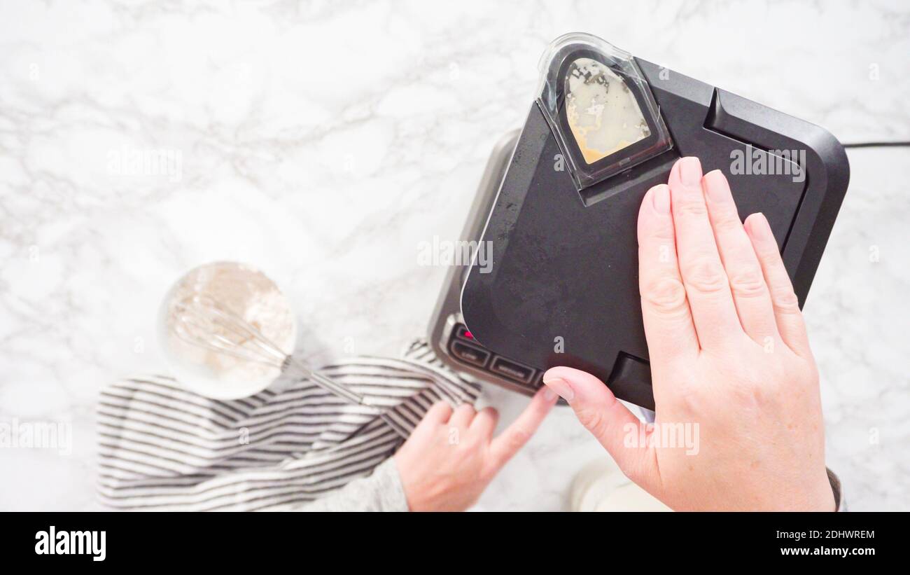 Flat lay. Mixing ingredient in an electric blender to make the crepes