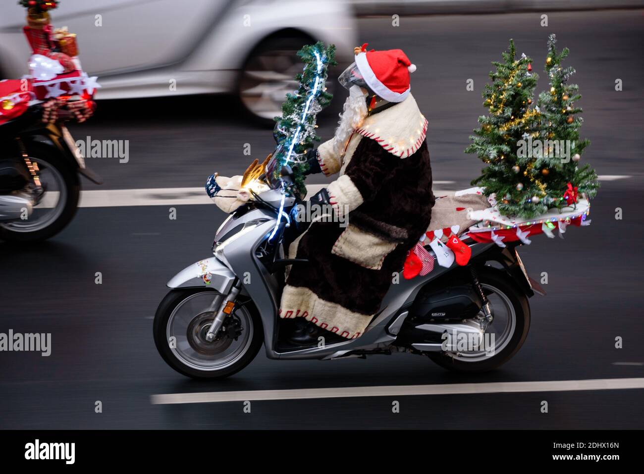 Berlin, Berlin, Germany. 12th Dec, 2020. Bikers ride on decorated machines dressed up as Santas, reindeer and angels while riding through the streets of Berlin on the 23 edition of the Christmas bike tour. With the action of the 'Santa Claus on Road e.V.' charitable projects in Berlin are supported such as the station mission at the Zoologischer Garten and the children's farm Pinke-Panke. Credit: Jan Scheunert/ZUMA Wire/Alamy Live News Stock Photo