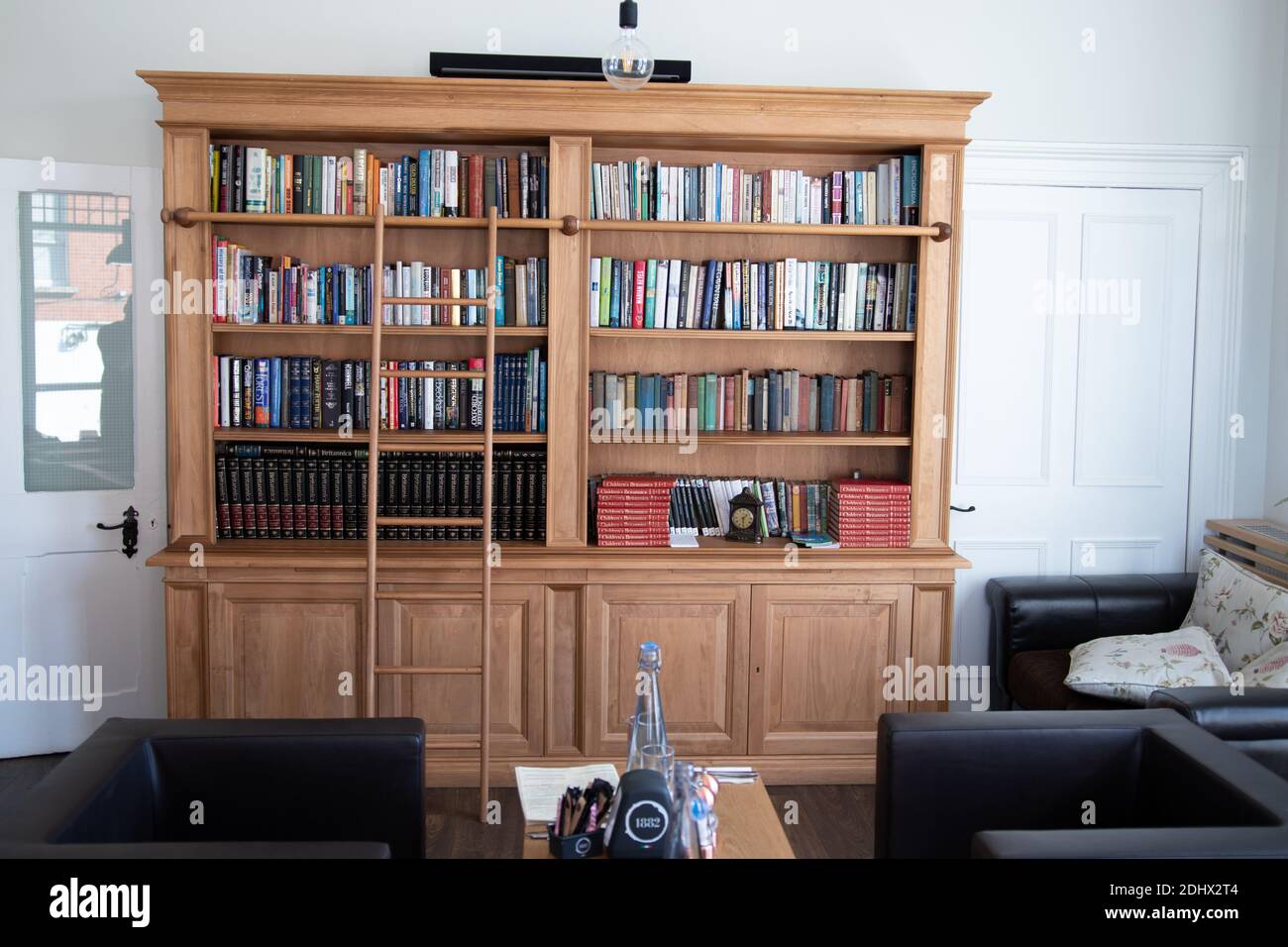 Classic style wooden bookshelf with a range of interesting books
