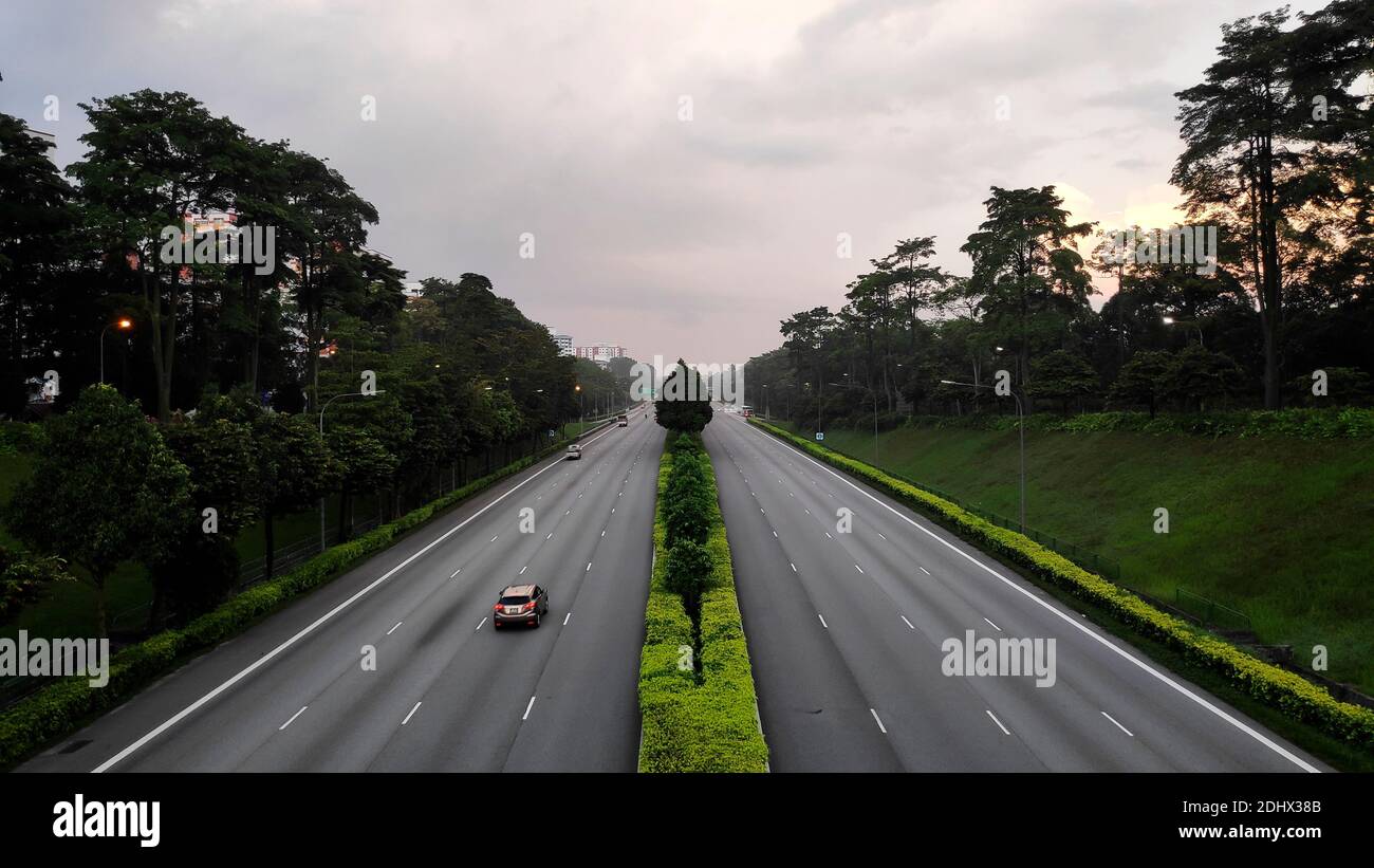 Wide urban freeway in Singapore during the morning hour Stock Photo - Alamy