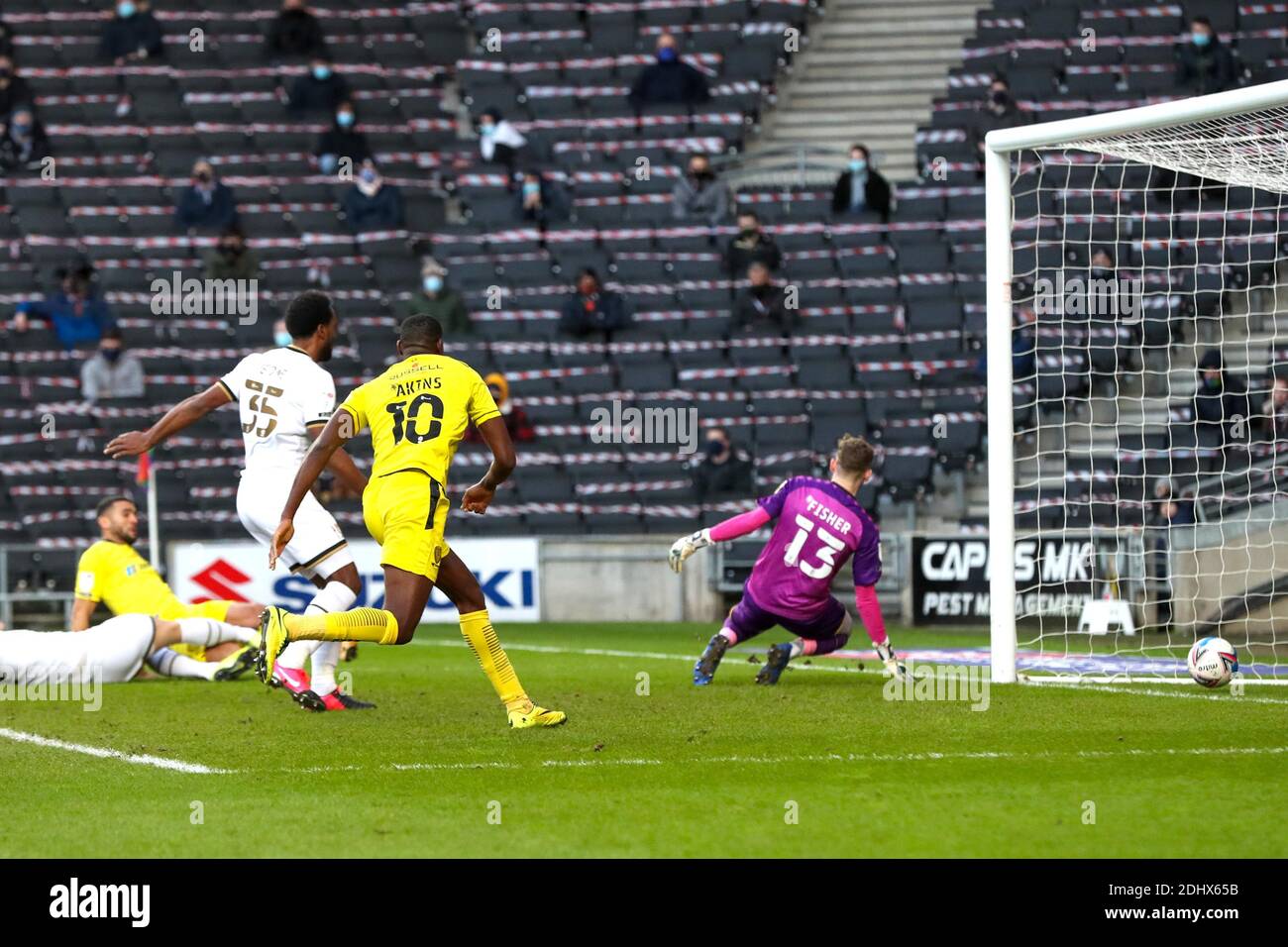 MILTON KEYNES, ENGLAND. DECEMBER 12TH. Colin Daniel scores for Burton  Albion, to take the lead to make it 1 - 0 against Milton Keynes Dons,  during the Sky Bet League One match