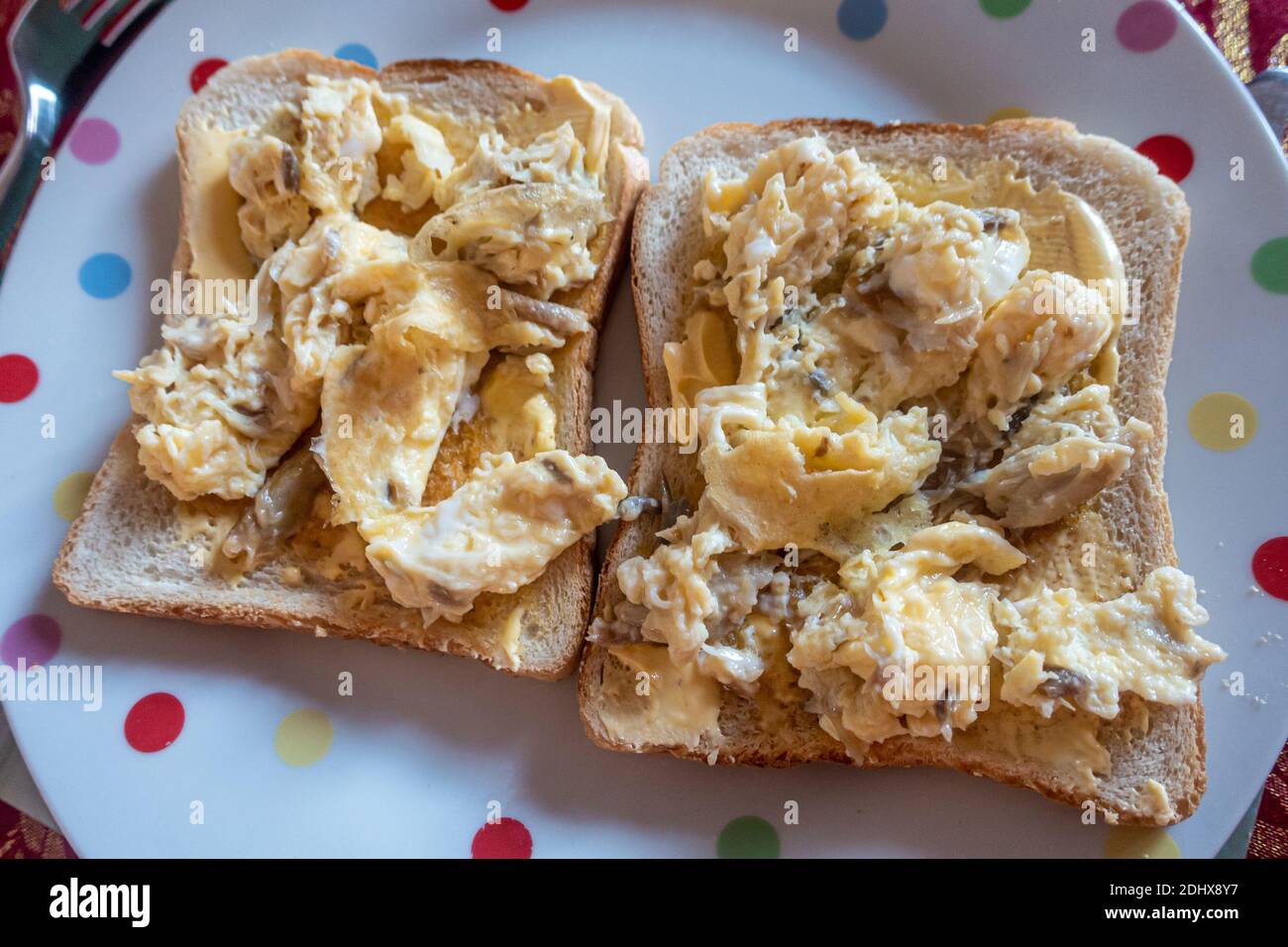 Scrambled eggs with smoked mackerel on toast Stock Photo Alamy