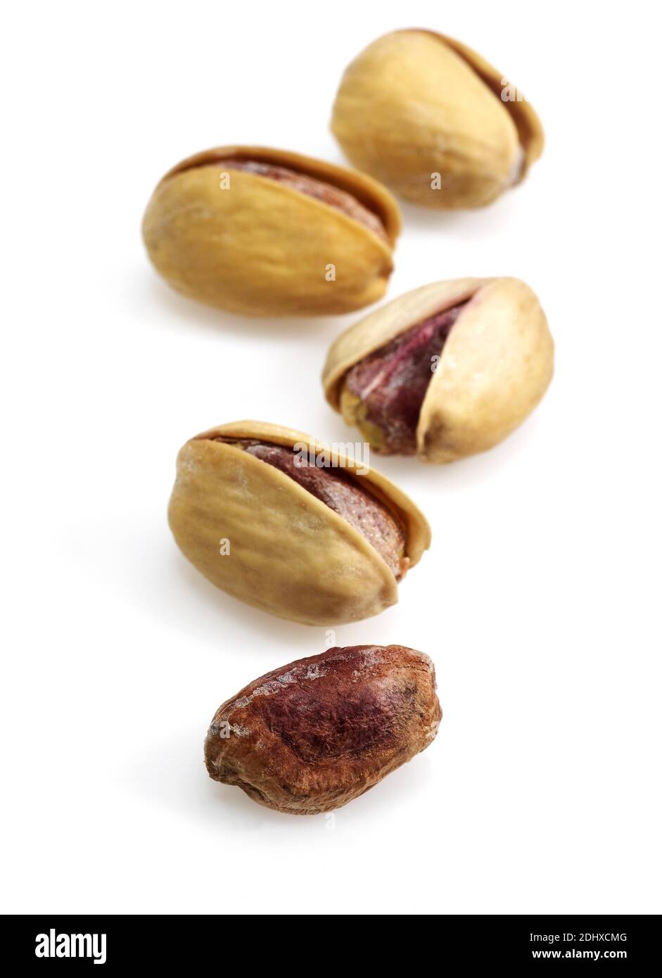 Pistachio Nuts, pistacia vera, Dry Fruits against White Background