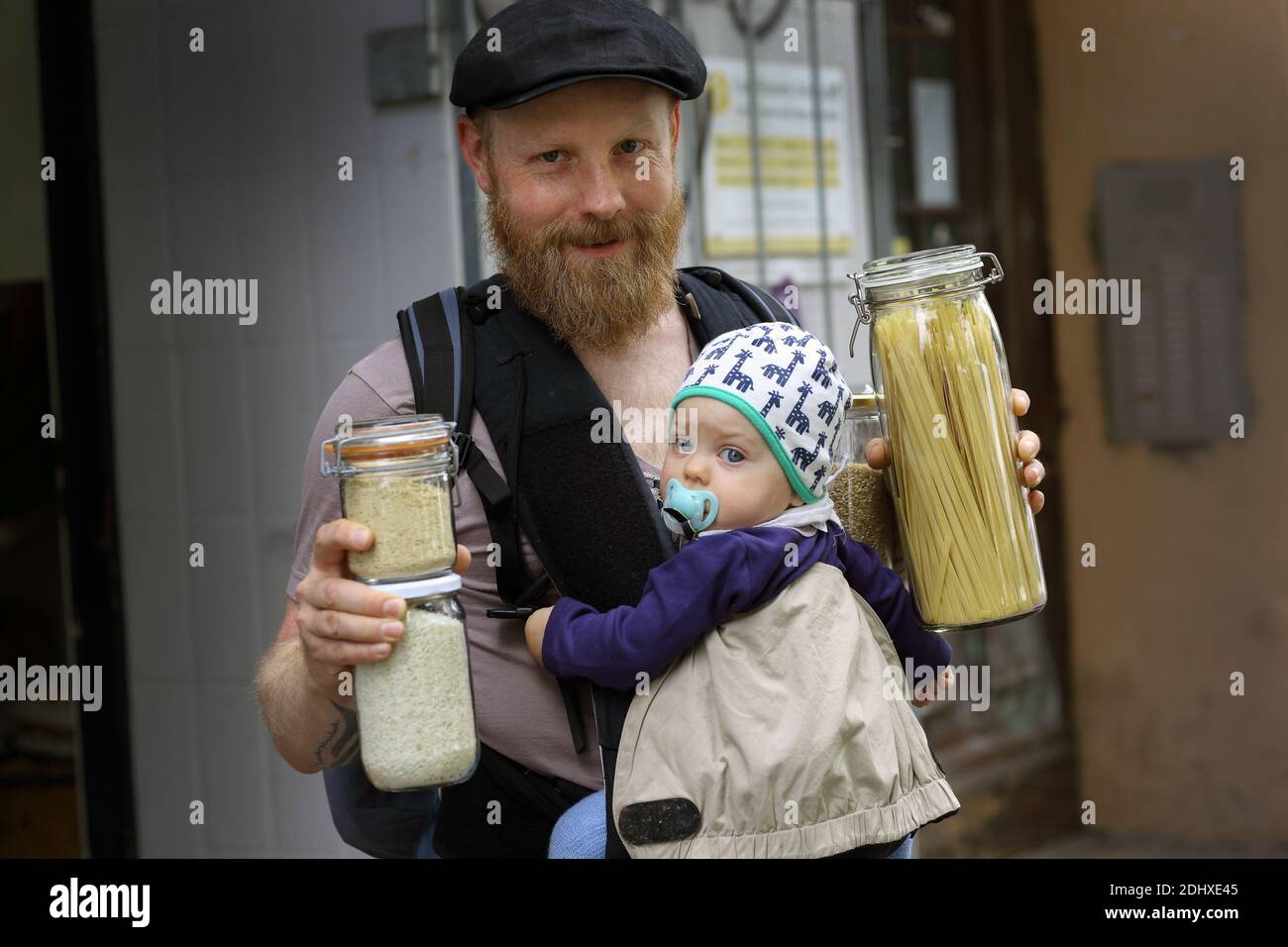 Germany / Berlin / Customers bring their own containers and fill them with anything from olive oil to washing up liquid, at Original Unverpackt,. Stock Photo