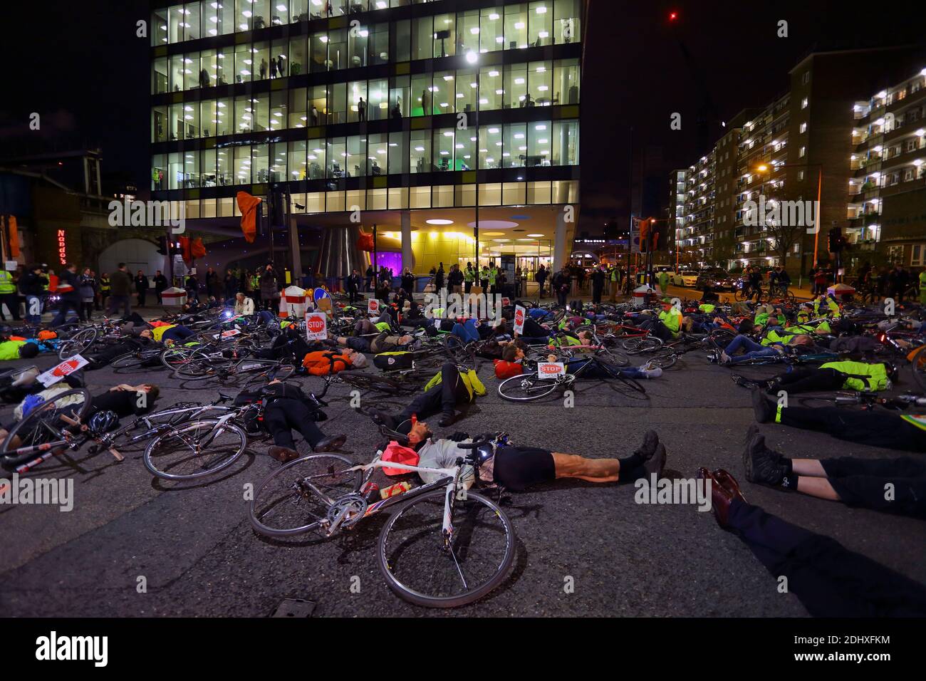 Cyclists stage a mass Die in outside the headquarters of Transport for London to campaign for better safety provision for cyclists on Londons roads. Stock Photo