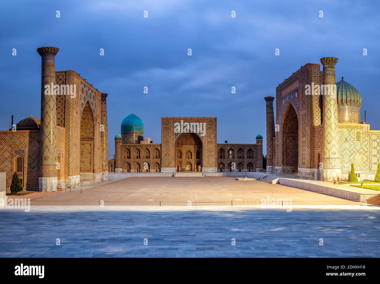 Registan square at evening twilight, Samarkand, Uzbekistan Stock Photo