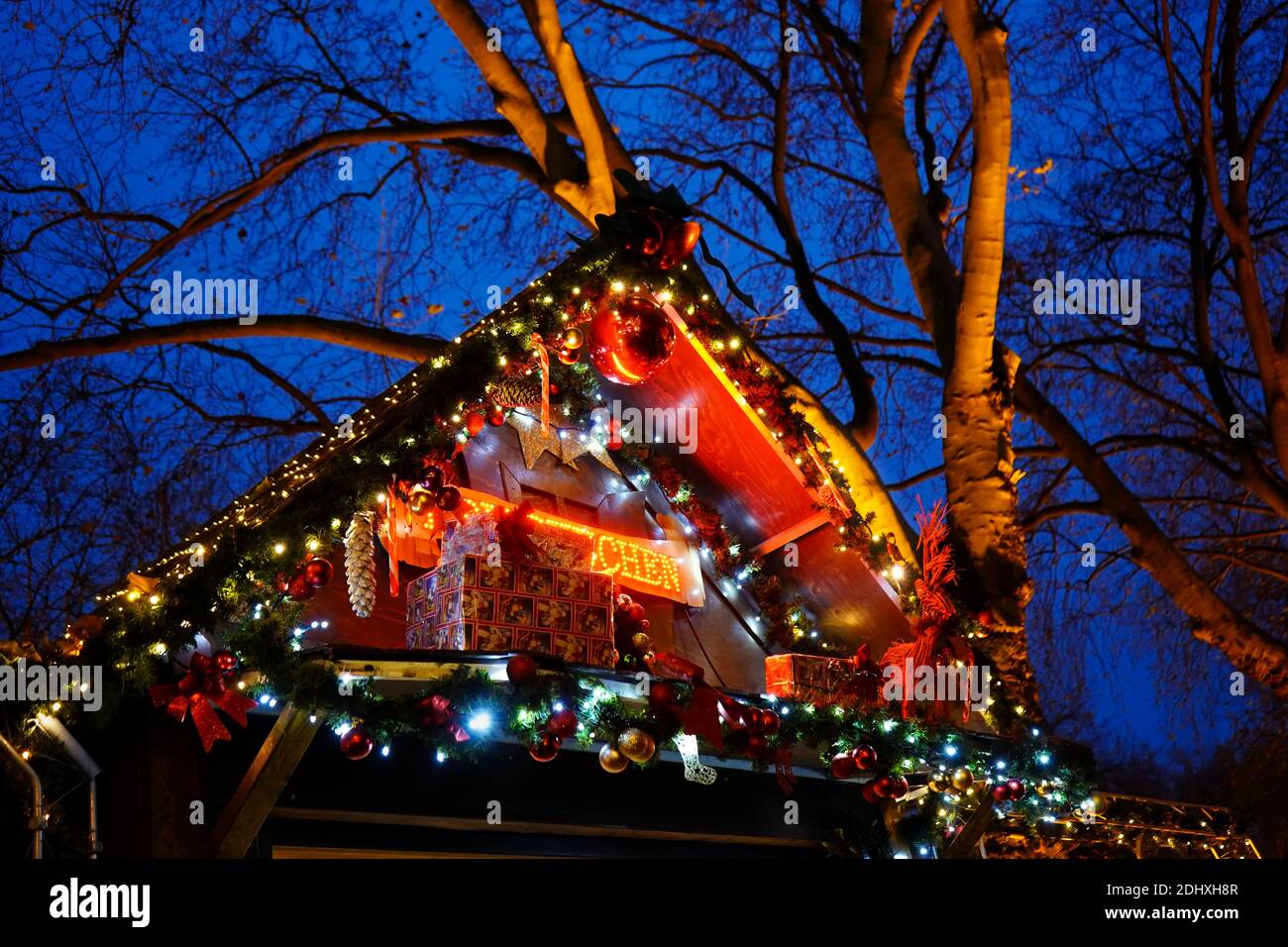 Close-up of an illuminated Christmas market booth on Königsallee in Düsseldorf, Germany. Stock Photo