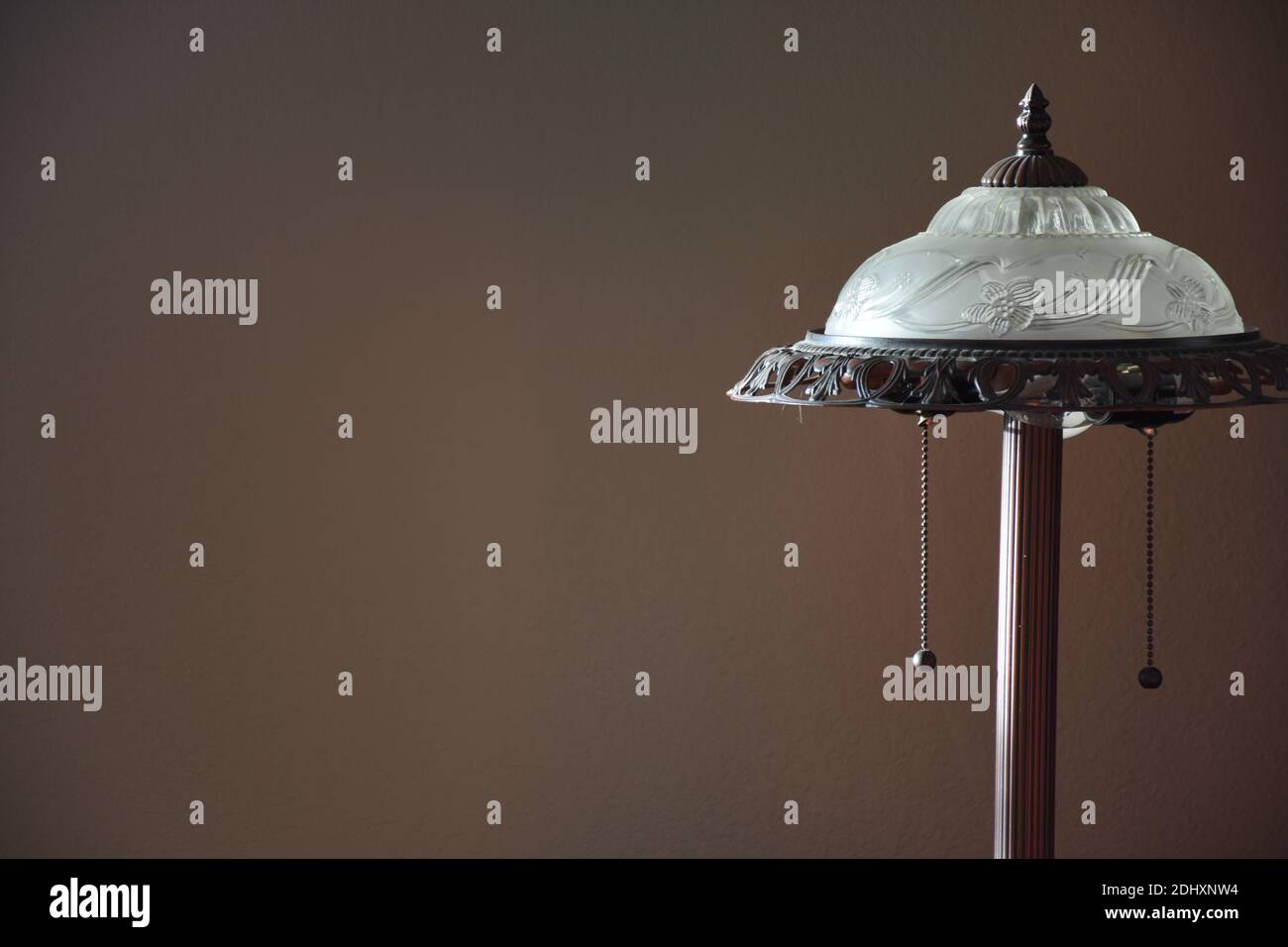 reproduction of older style electric lamp with 2 bulbs and pull chains