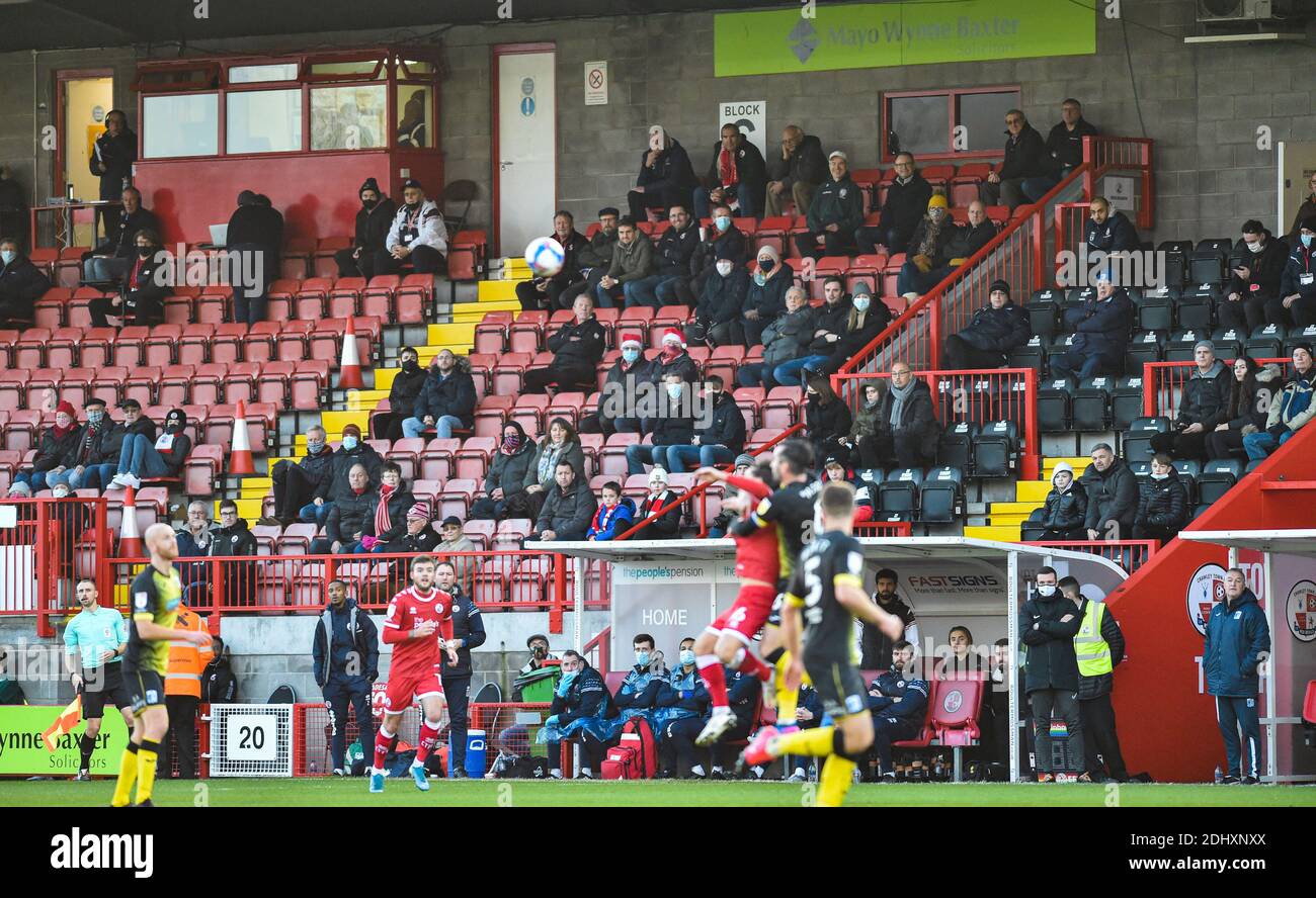 Crawley UK 12th December 2020 - Fans back in the stadium watch the match during the Sky Bet EFL League Two match between Crawley Town and Barrow AFC  at the People's Pension Stadium - Editorial use only. No merchandising.  - for details contact Football Dataco  : Credit Simon Dack TPI / Alamy Live News Stock Photo