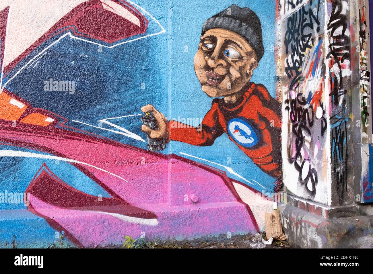 Human likeness of a spraypainter on a wall in Munich, Bavaria, Germany. Stock Photo