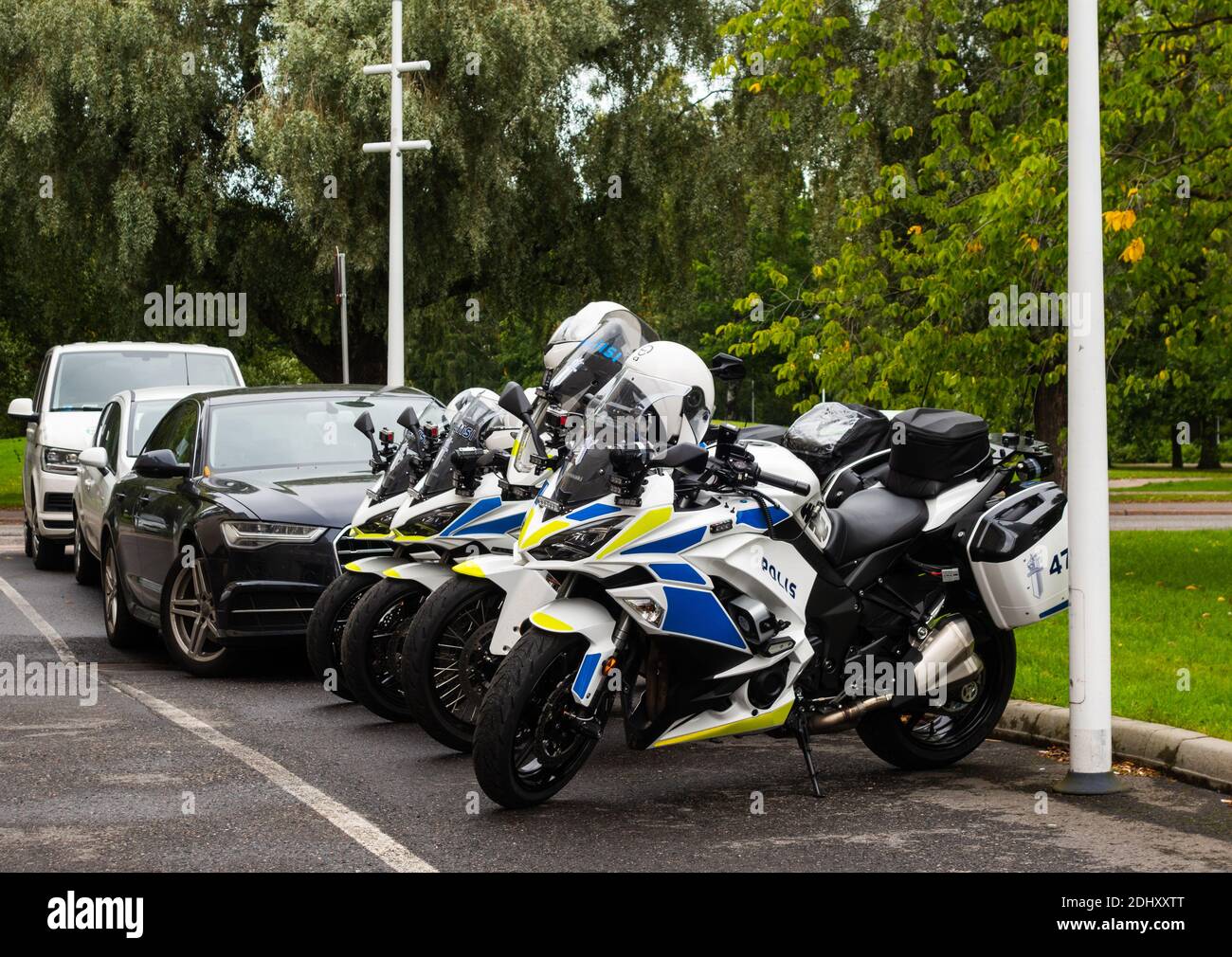 Editorial 09.11.2020 Helsinki Finland Police motorbikes parked outside a lunch restaurant on a summer day Stock Photo