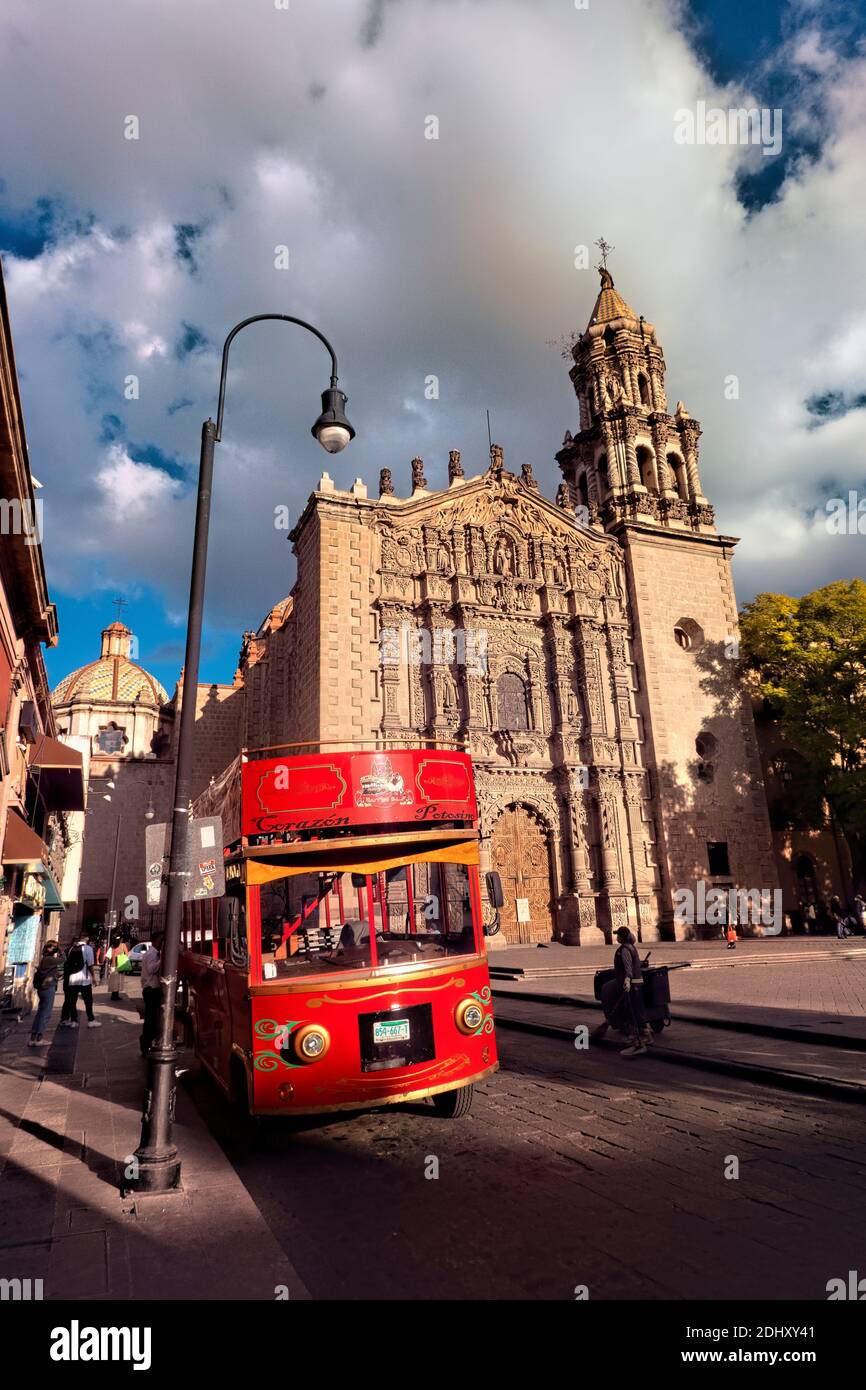 Sightseeing bus and El Carmen church, San Luis Potosi, Mexico Stock Photo