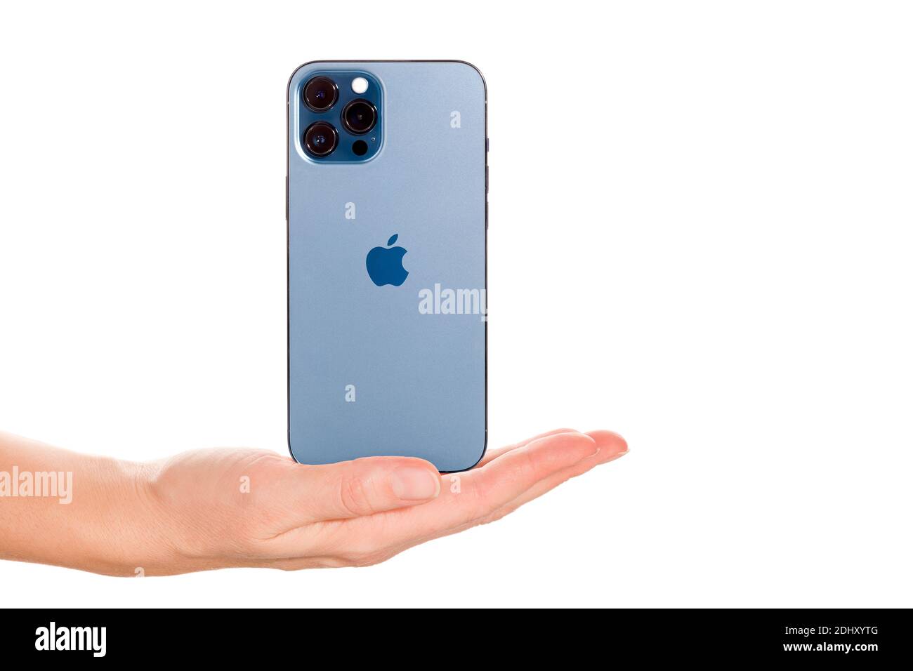 Bratislava Slovakia December 07 Female Hand Presenting The New Iphone 12 Pro Max Pacific Blue Isolated On White Background Stock Photo Alamy