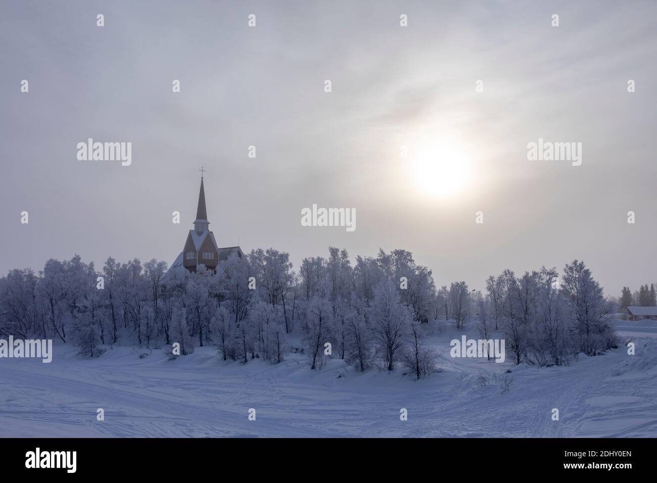 Lapland, Finland: scenic view of a church in a snowy forest near the border between Finland and Sweden Stock Photo