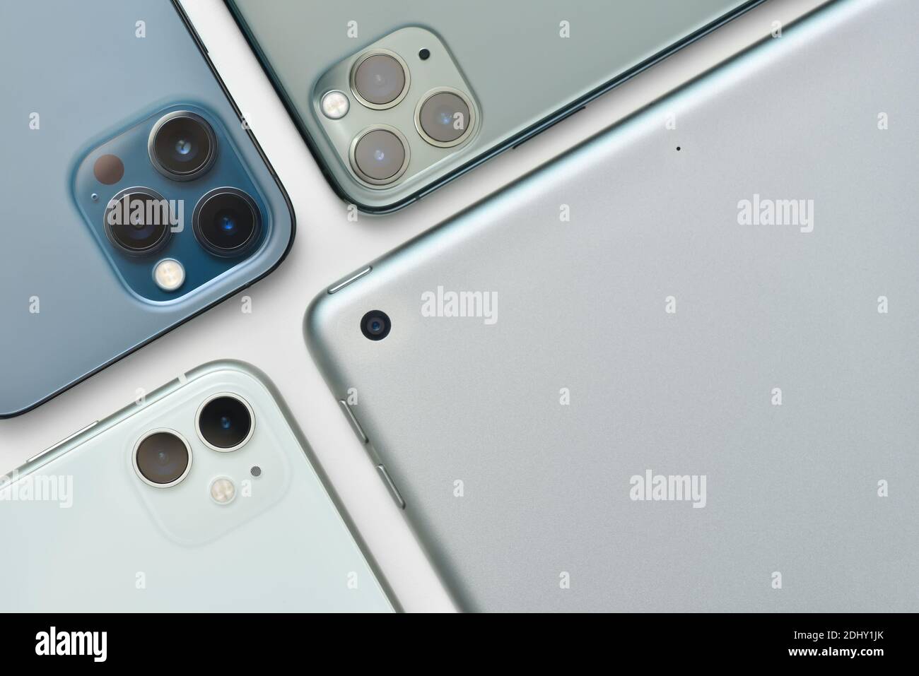 STARIY OSKOL, RUSSIA - DECEMBER 10, 2020: Camera lenses of modern Apple smartphones iPhone 11 and 12 Stock Photo