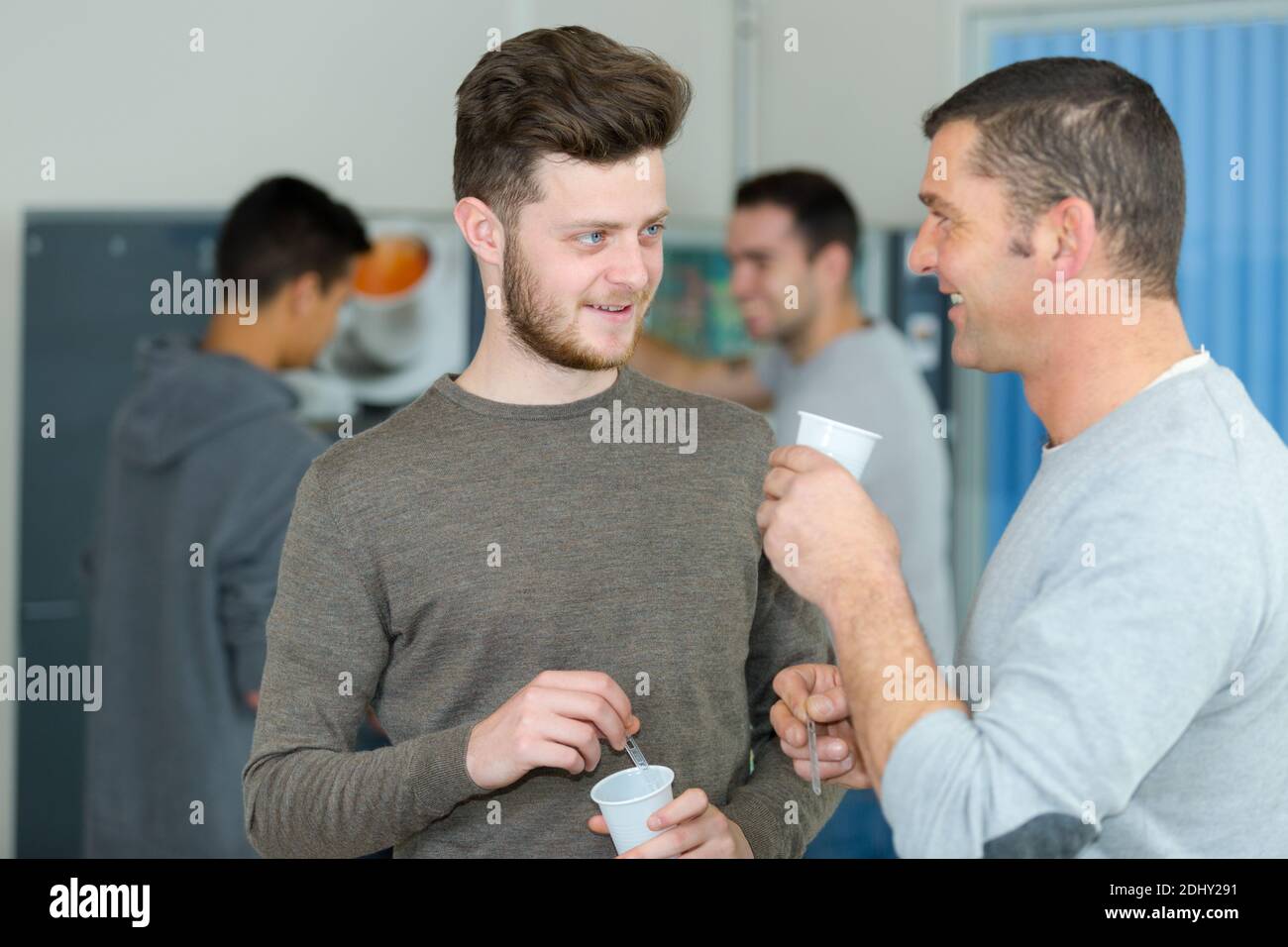 enjoying spending leisure time on work break with colleagues Stock Photo
