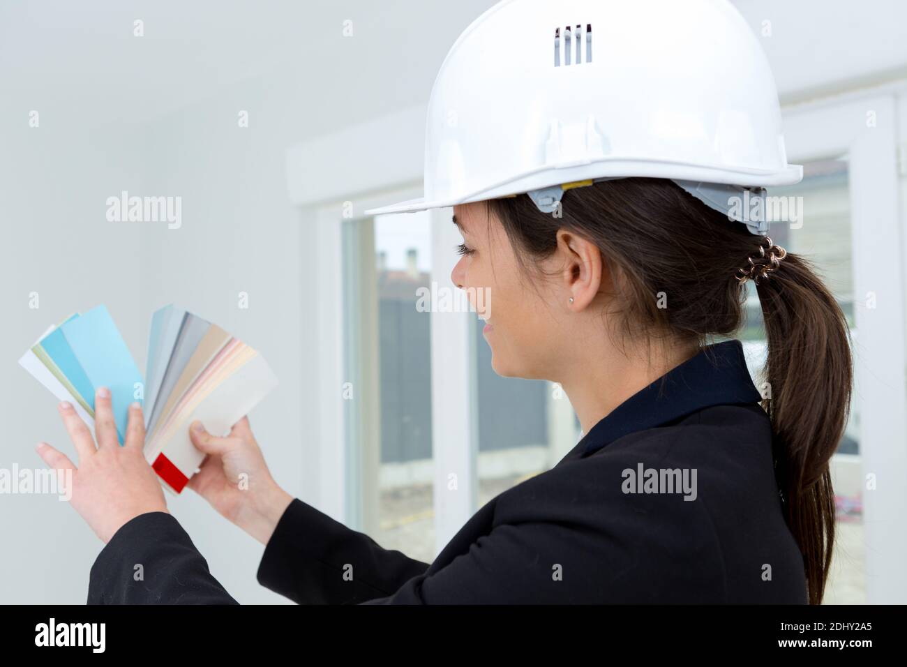 confident interior designer using color swatches Stock Photo