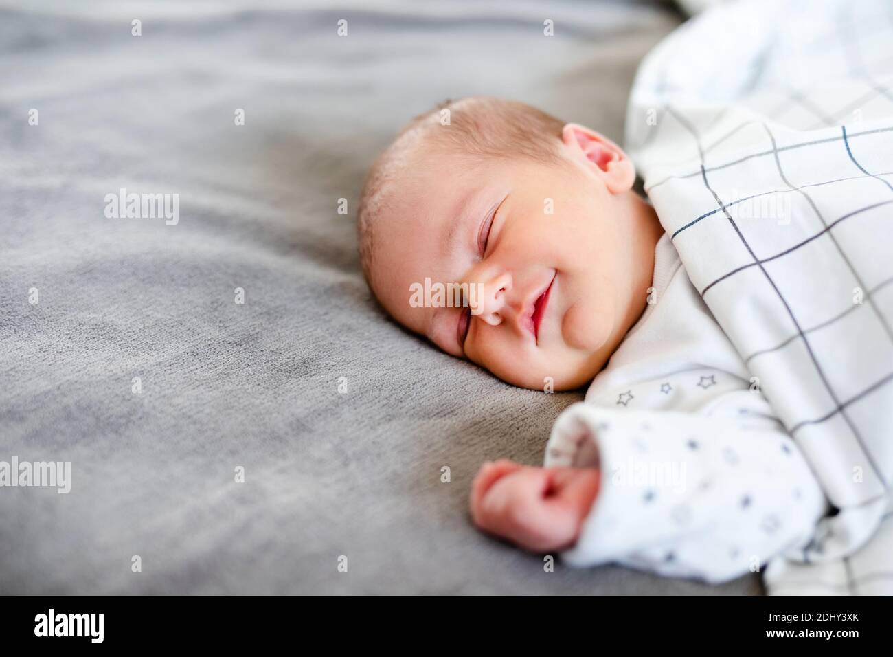 Newborn baby sleep first days of life. Cute little newborn child