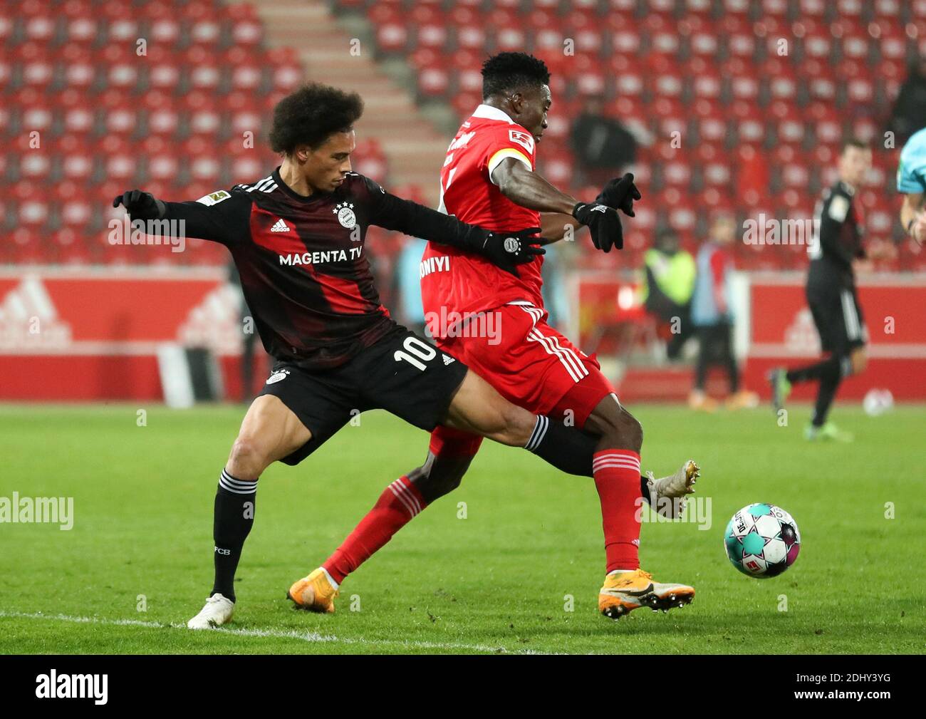 Berlin, Germany. 12th December, 2020. Leroy Sane FC Bayern Munich fights for the ball all with Taiwo Awoniyi FC Union Berlin FC Union Berlin - FC Bayern Munich 12.12.2020 stadium An der alten Foersterei Football 1 . Bundesliga Saison 2020 / 2021 Credit : diebilderwelt / Alamy Live News Stock Photo