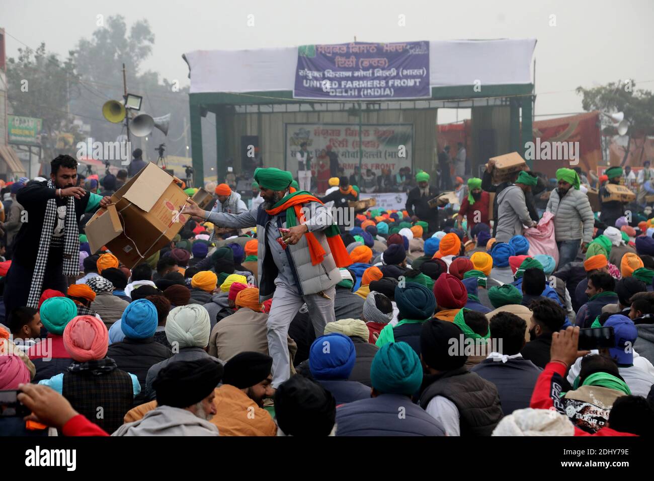 Protesters gathering during the demonstration.Thousands of farmers from Punjab, Haryana and Uttar Pradesh blocked Singhu border (Delhi-Haryana Highway), Ghazipur border (Delhi-Meerut Highway), Tikri border and Gurugram Border agitating for the 17 days. Against the Centre's new farm reform laws.  Indian Union Minister of Agriculture and Farmers Welfare, Narendra Singh Tomar appeals to farmers to end their protest and work with the government. Stock Photo