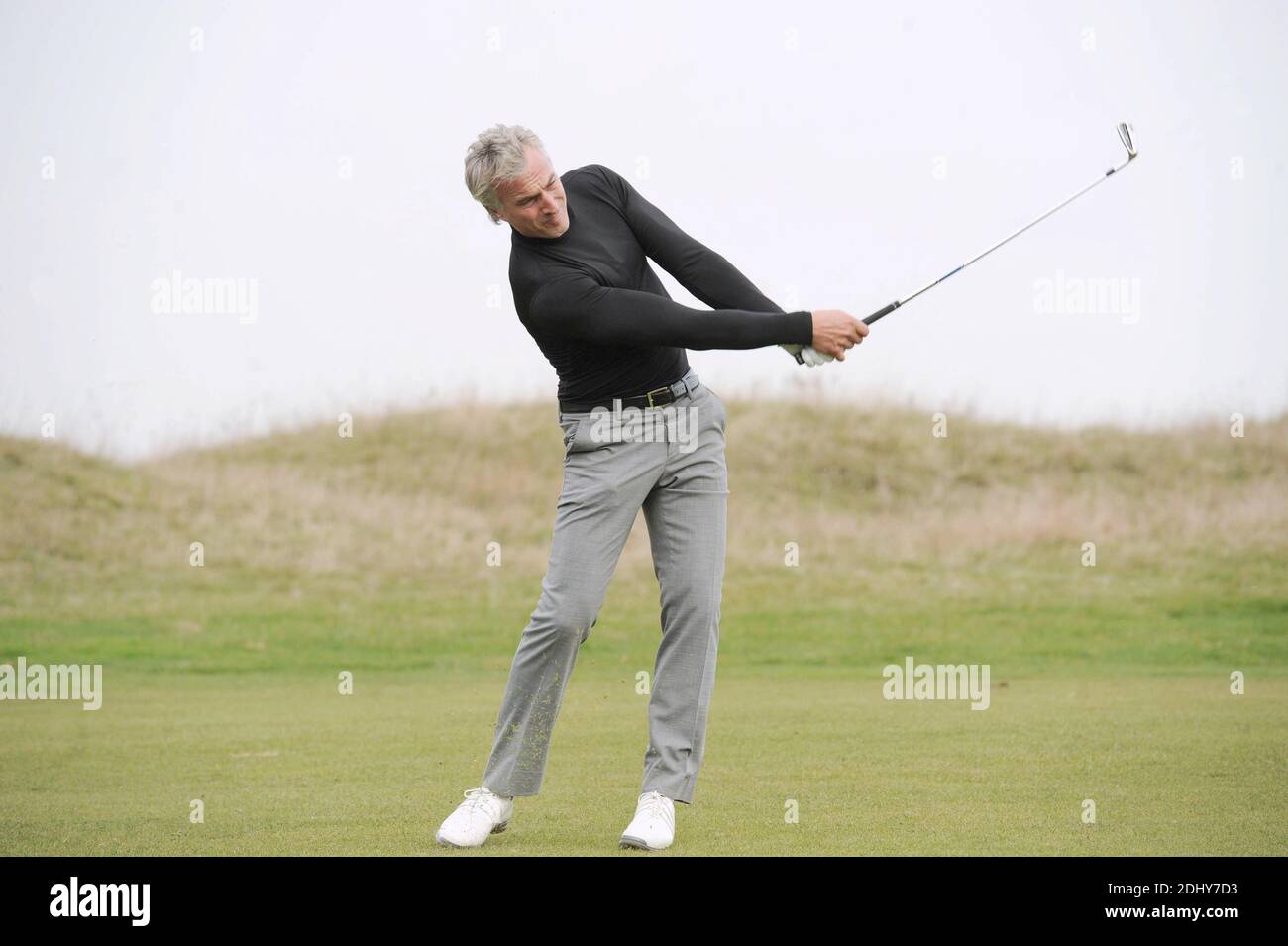 File photo : David Ginola plays golf during the Novotel Celebrity  tournament at the Golf National in Guyancourt near Paris, France on October  15, 2010. Former Newcastle United and PSG player David