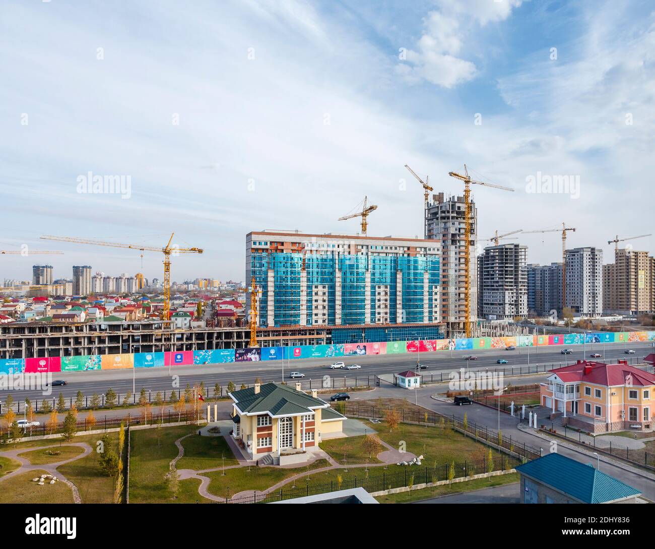 Construction site: building works being carried out on the development of a new modern apartment building, Nur-Sultan (Astana), capital city of Kazakh Stock Photo